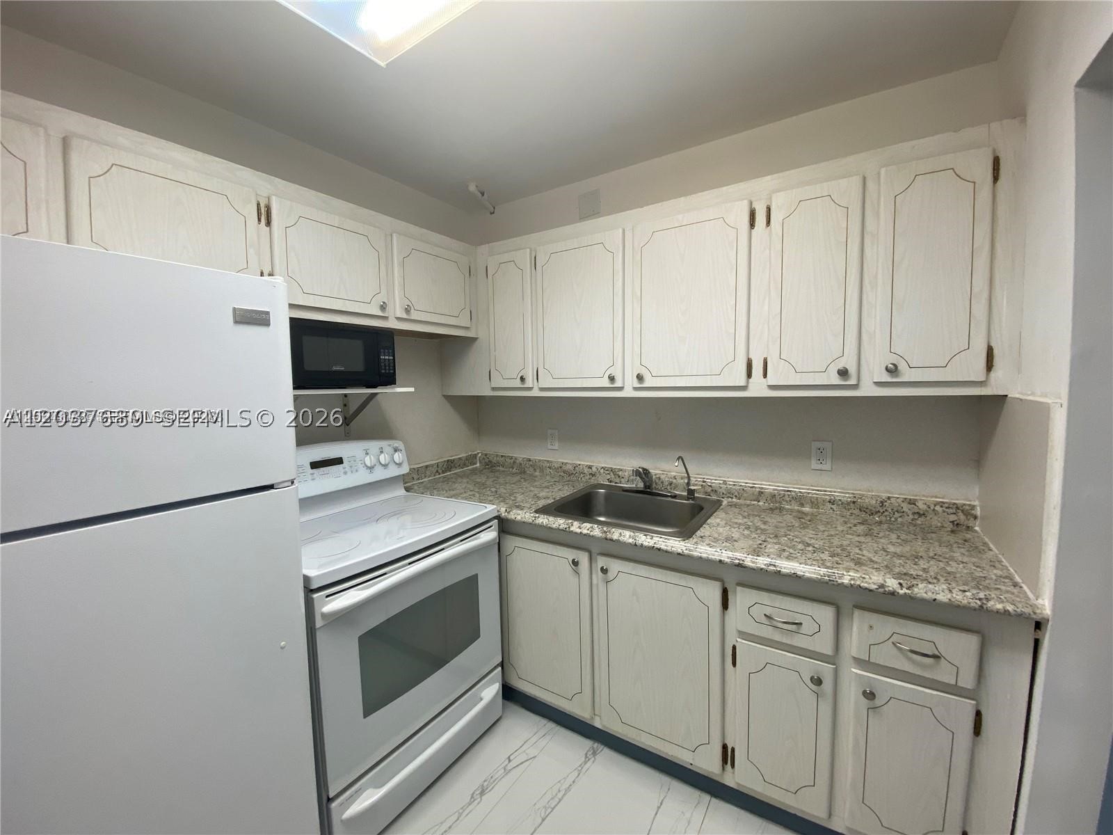 TILFORD F CONDO - Residential