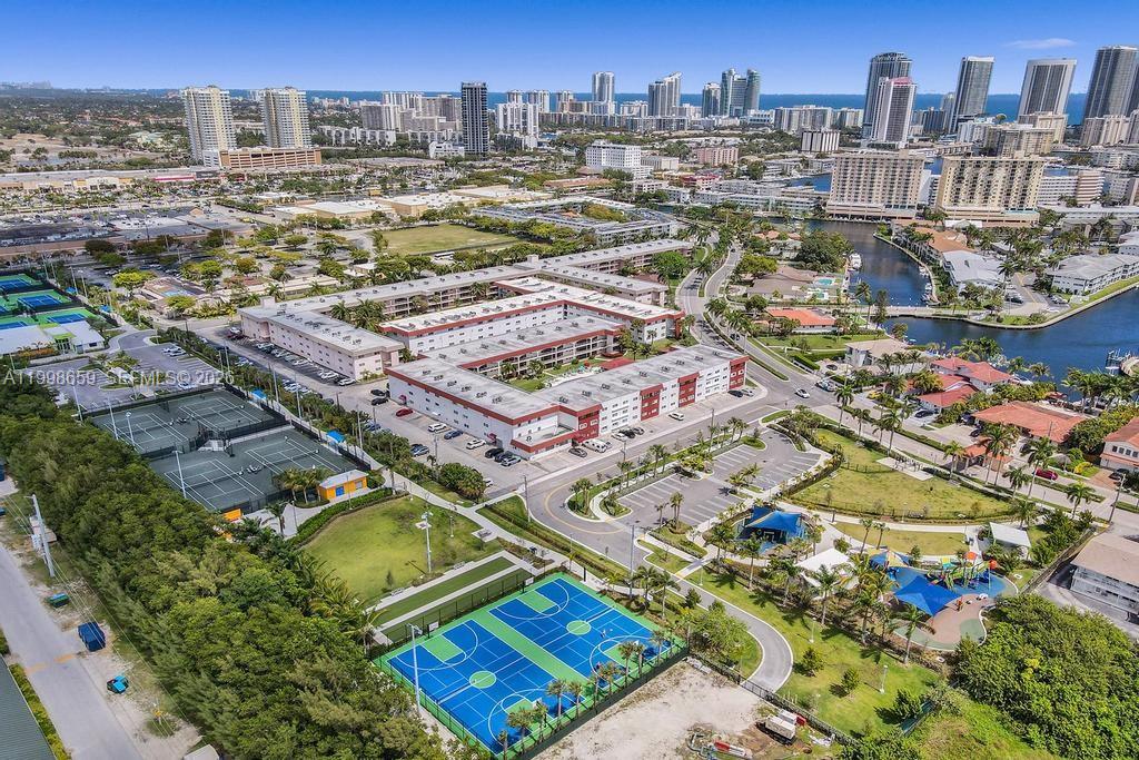 Location, location, location! 1bd 1 bath CO-OP at CASA PARADISO in the heart of HALLANDALE BEACH. White kitchen, tile floor in all living area and beautiful and new trendy bathroom. New carpet in the bedroom. Large Screened patio overlooking the pool. The unit has tons of natural light.  Gated community for all ages near the beaches, the stores, restaurants, Gulfstream, new Tennis center & park etc. Low maintenance fees, reserves & new roof. Amenities include pool, shuffle board, BBQ area, storage, laundry room & waterfront lot with grill, tables & dock. THE CO-OP owns the land & also a private lot on the Intracoastal Bay, Don't wait! Cash only, can rent after 2 years. 50 Years recertification is done, no special assessment.