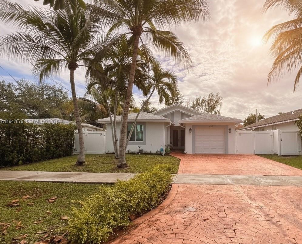 Why settle for a condo when you can own a private, turnkey 3-bed, 2-bath residence with zero monthly fees? Located East of I-95, this 1995-built CBS gem is a masterclass in South Florida efficiency. Updated Roof, A/C, and Full Impact Glass windows and doors. These aren't just upgrades; they will give you the opportunity of obtaining savings in your insurance premiums. The climatized tiled garage is a "chameleon" room—perfect for a high-end podcast studio, executive home office, or gym. A lush, spacious lot with room for a pool. Modern flooring, open-concept living, and a private backyard make this the ultimate primary residence or high-yield AIRBNB opportunity (No restrictions!). Situated minutes from the Aventura Mall, Gulfstream Park, and the beachMove in and start living—the hard work is already done.