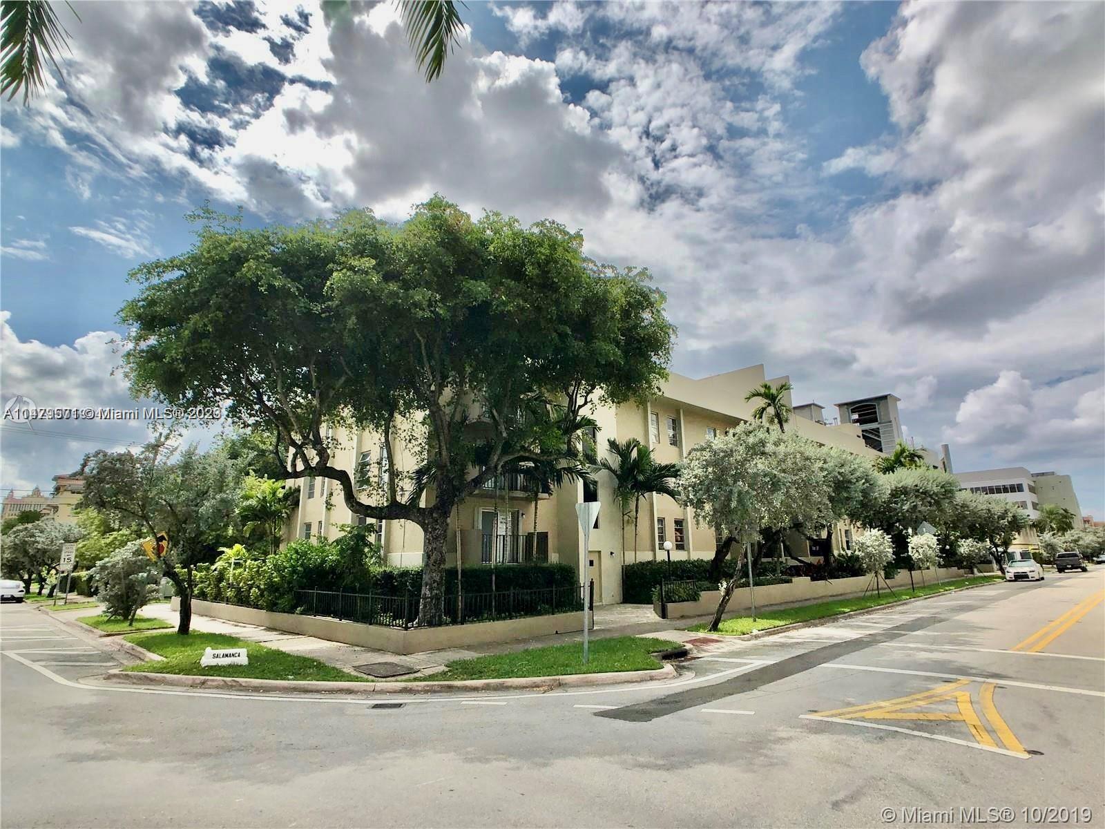 Lovely, spacious, clean, light & bright 2 bedroom 2 bathroom condo blocks from all that Miracle Mile & Coral Gables have to offer.  Rent price lowered to rent right away. Tiled throughout. Updated bathrooms. Large bedrooms with large closets.  Master has walk-in closet. Garden view from balcony. Pets OK. Pool view from master bedroom. Secure entry. One assigned parking space inside gated parking area. Guest parking available. Additional street parking available. Unit has an additional storage space in storage room. Community swimming pool.  Building has washer & dryer on first floor. Great Location. Application for association in attachments.