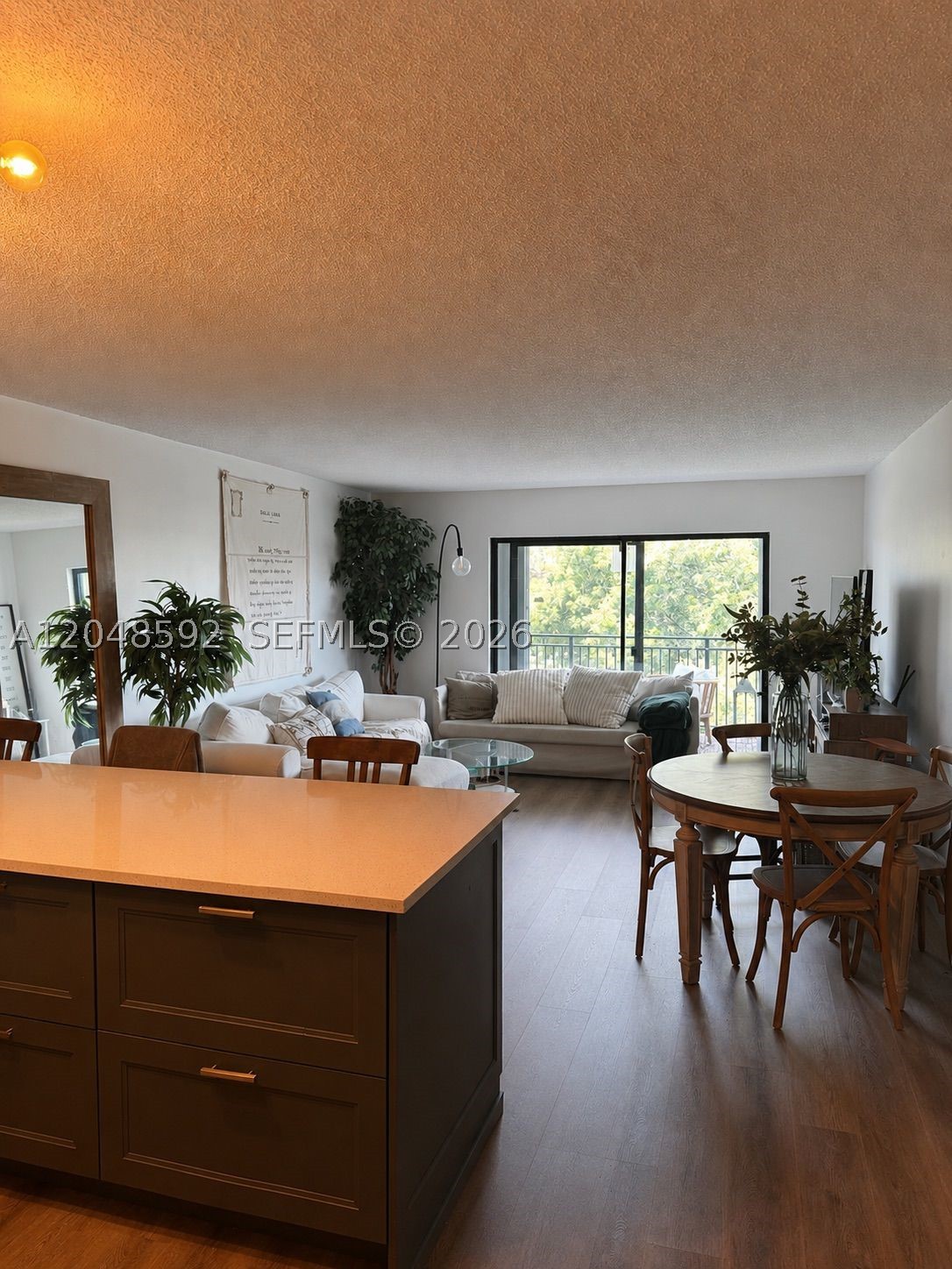 Beautifully maintained 3-bedroom, 2-bath condo in desirable Fairways at Bonaventure in Weston with spectacular golf course views. This owner-occupied residence features a bright and spacious layout, a large covered open balcony overlooking the golf course, renovated floors, updated kitchen with remodeled countertops and cabinetry, and washer/dryer inside the unit. Enjoy the peace of mind of a very well-kept home that has not been used as a rental. The expensive special assessment has been paid in full by the seller, offering excellent value to the buyer. Monthly association fee includes common areas, outside maintenance, pool service, trash removal, community pool and tennis courts. Residents also enjoy access to Bonaventure Town Center Club. Excellent Weston location close to top-rated schools, shopping, dining, parks and major highways.