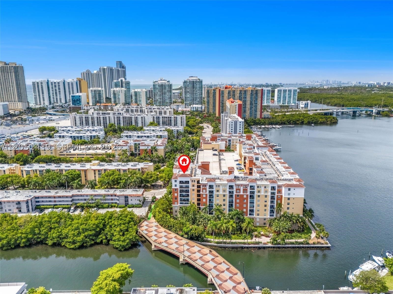 Imagine a perfect three-bedroom apartment where style meets comfort. This is the largest model in the complex, located on the 8th floor, featuring fully replaced appliances, upgraded flooring, and modern bathrooms. The double-sized balcony offers serene canal views. With two assigned covered parking spaces, it’s just a 10-minute walk from the beach, a top K-8 school, and shopping. Pet-friendly and rich in premium amenities—heated pool, jacuzzi, large gym, party room, kids’ room, and office space. While rentals are limited to three times per year, this ensures stability. With no current assessments, reserves in place, and easy financing, this apartment is a rare opportunity for living or investment.
