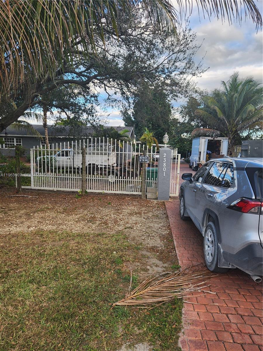 This 2314 square foot Beautiful single family home with 3 bedrooms and 2.0 bathrooms with a big Patio and lot of space to add more rooms is located in the Redland area on a 2.52 acres with more than 200 different Fruit trees . new water heater and AC and Impact on all doors and windows .LOT to see