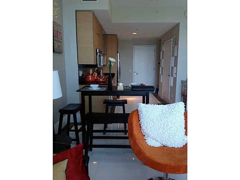 PICTURES SPEAK LOUDER THAN WORDS. FULLY FURNISHED, DECORATED BY A RENOWNED INTERIOR DESIGNER, TURN KEY, IMPECCABLE UNIT, WATER AND CITY VIEWS, ICONIC-AWARDED INFINITY BUILDING. TWO BALCONIES, ONE TO THE EAST, ONE TO THE WEST. EASY ACCESS TO RESTAURANTS, N IGHT LIFE, THE BEACH AND MAYOR HIGHWAYS. E-BLINDS, WALL MOUNTED TVS,  UNIT HAS IT ALL!!! JUST BRING YOUR TOOHBRUSH.