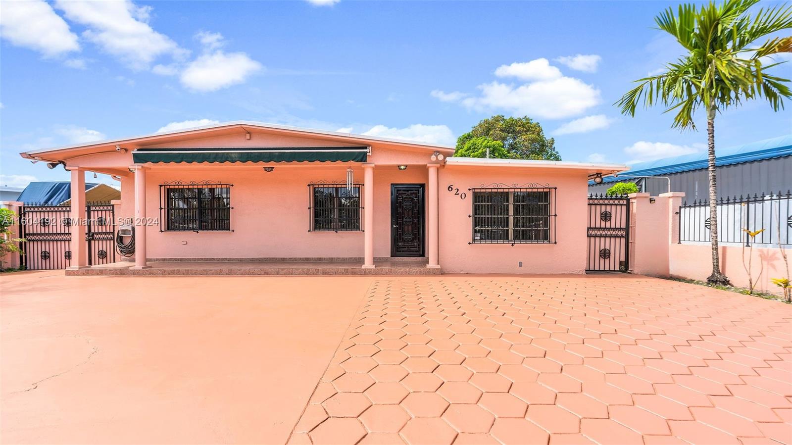 This charming 4-bedroom, 3-bathroom home offers incredible potential in a prime location near NW 103rd St/W 49th Street. With a welcoming floor plan, ample parking, and a backyard oasis featuring a refreshing pool, this property is perfect for families and entertainers alike. Ready for your personal touch, this home provides the ideal canvas to create your dream space. Enjoy the convenience of nearby schools, parks, shopping, and dining. Don't miss out on this centrally located, spacious home. Schedule your showing today!