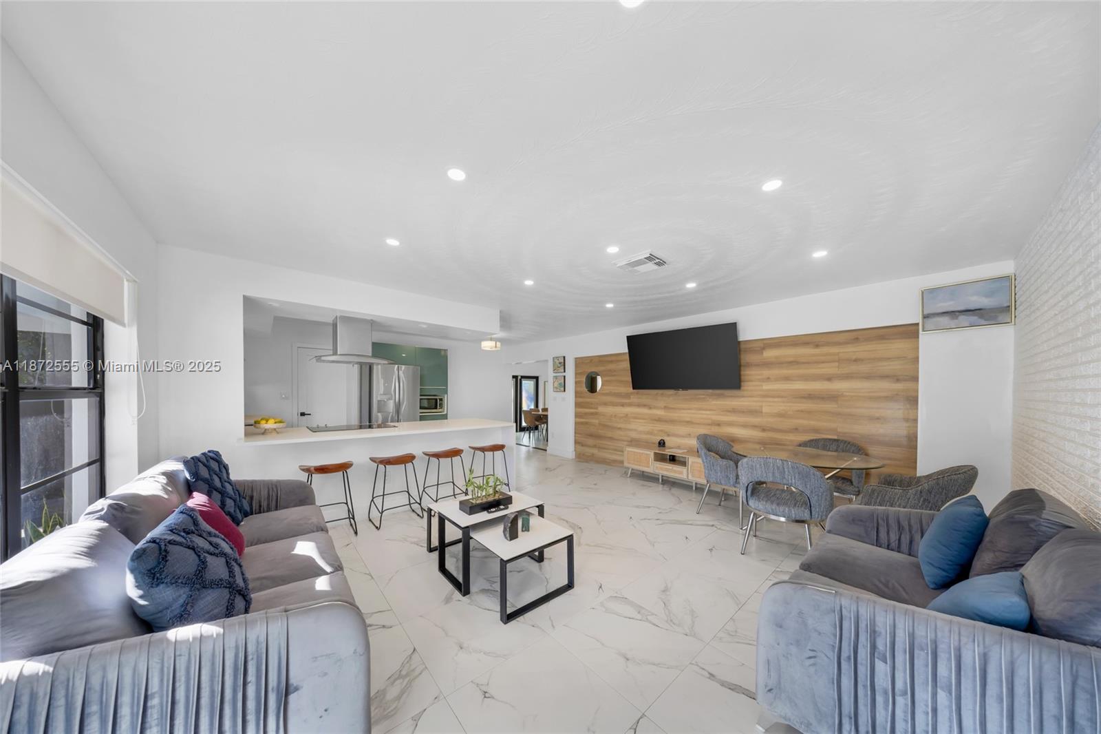 *Reduced for Quick Sale* This impeccably updated and fully furnished 4-bedroom, 3-bathroom residence is more than a home—it’s an opportunity. Nestled in unincorporated Dade County, it offers the flexibility of short-term rentals, making it ideal for both investors and end-users. Every detail has been elevated with brand-new fixtures, custom closets, and state-of-the-art appliances.

Step outside to your own private oasis featuring a resort-style pool and expansive outdoor BBQ lounge—perfect for entertaining or relaxing in true Miami fashion. The coveted location places you minutes from the sophistication of Miami Shores and Biscayne Park, with effortless access to world-class dining, shopping, and nightlife.