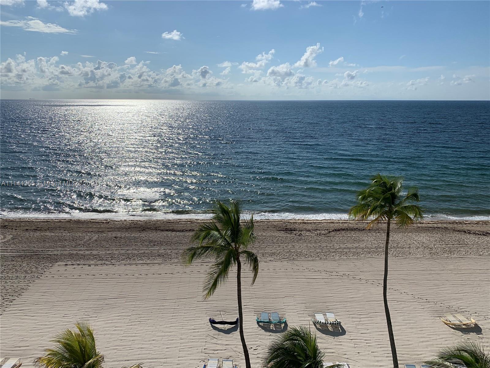 JUST REDUCED FOR CASH ONLY DEALS .DIRECT UNOBSTRUCTED OCEANFRONT ON ATLANTIC OCEAN.LIVING AREA ALMOST 2000 SQ FT. DEEDED GARAGE SPACE. CAN'T BEAT LOCATION OR SPACE. HUGE WRAP-AROUND BALCONY- ONE OF THE LARGEST ON GALT MILE-SEE ALL THE WAY TO POMPANO PIER. SEE THE SUNRISE EACH MORNING & THE MOONRISE EVENINGS. SWIM IN THE OCEAN DAILY....LIKE A PERMANENT VACATION. 2 BEDROOM-2 BATH. NEUTRAL POCELAIN TILE FLOORS THROUGHOUT. SPACIOUS LIVING-DINING ROOM WITH ENCLOSED BAR. UPDATED BATHS & KITCHEN W GRANITE COUNTERTOPS.DEN COULD BE A THIRD BEDROOM IF DESIRED. MASTER BATH DOUBLE STAINLESS SINKS. WALK-IN SHOWER & TUB/SHOWER COMBO. LAUNDRY ROOM IN APARTMENT. WALK TO GROCERY, DRUG STORE, BANKS, TEMPLE & MANY RESTAURANTS. HIGH IMPACT WINDOWS.