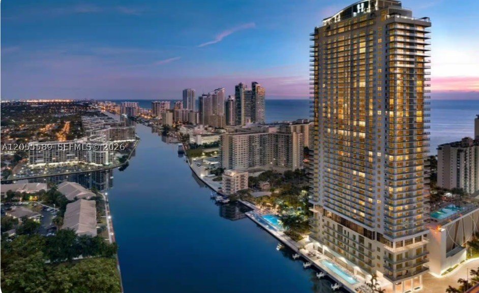 Experience resort-style living in this beautifully furnished 3-bedroom, 2-bath residence featuring soaring double-height ceilings that fill the home with natural light and create an impressive sense of space. All three bedrooms offer direct access to the expansive private terrace, where you can enjoy breathtaking Intracoastal and city views. Located on one of the building's most desirable lower floors, residents also benefit from a dedicated elevator serving only the first six levels, providing faster and more convenient access. Enjoy an exceptional collection of 5-star amenities, including private beach club access, two resort-style pools, a poolside bar, fitness center, tennis court, outdoor movie theater, and much more.
Ideally located just minutes from the beach, Aventura Mall, Gulfstream Park & Casino, fine dining, and entertainment, this residence offers the perfect blend of luxury, comfort, and convenience. Whether you're relocating, working remotely, or simply looking to embrace the South Florida lifestyle, this exceptional waterfront home is move-in ready and waiting for you.