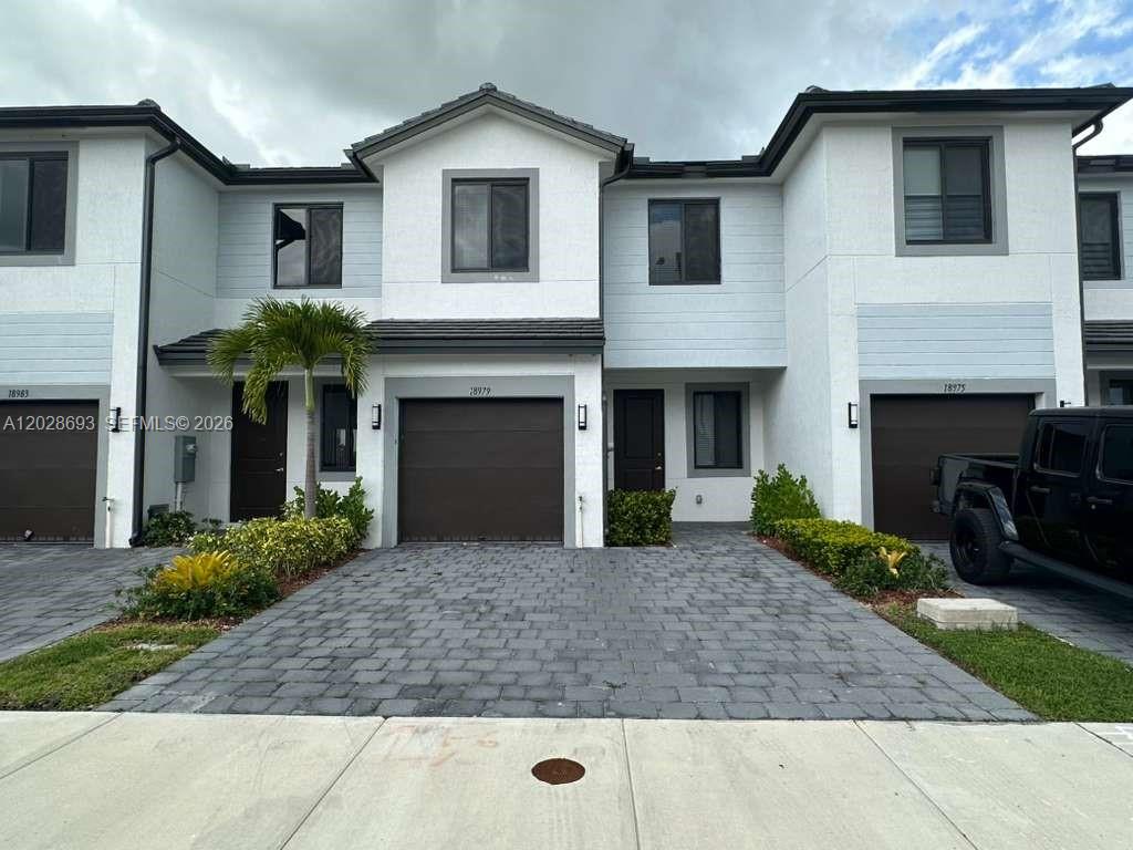 Beautiful brand-new townhouse located in the desirable Century Park Square community. This modern residence features 3 bedrooms, 2.5 bathrooms, and approximately 1,558 SqFt of living area. Open-concept layout with spacious living and dining areas, contemporary kitchen, impact windows and doors, and ample natural light throughout. Conveniently located near major highways, schools, shopping centers, restaurants, and entertainment. Ready for immediate occupancy.