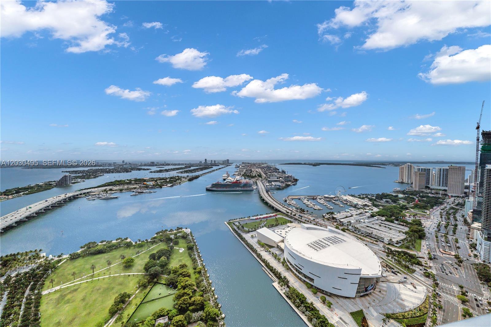 PH6205 at 900 Biscayne Bay is a flow-through penthouse with 3 bedrooms, 3.5 baths, a private elevator and foyer. Floor-to-ceiling glass showcases sweeping East and West views while two expansive balconies provide the perfect setting for sunrise and sunset views over Biscayne Bay and the Miami skyline
Inside, no detail has been overlooked. Custom wood paneling, 48" x 48" Italian porcelain flooring, designer LED lighting, and custom doors create a sophisticated modern aesthetic throughout. The chef's kitchen is appointed with premium Miele appliances, including double dishwashers and a built-in coffee system, a Sub-Zero refrigerator, wine cooler and ice maker. The spacious primary suite offers a luxurious retreat with stunning views, generous closet space, and a spa-inspired bath.
Residents enjoy world-class amenities including two resort-style pools, two state-of-the-art fitness centers, a full-service spa featuring sauna, steam room, and cold plunge, a movie theater, newly renovated residents room, outdoor BBQ, valet, and 24-hour security. Two assigned parking spaces are included
Located in the heart of Downtown Miami, with easy access to I95 and Miami Beach, is within walking distance to museums,  Arscht Center, Kasya Arena, dining, shopping, and Miami World center.