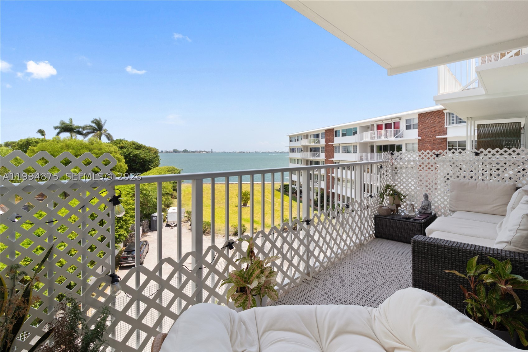 Spacious and bright 2 bedroom 2-bath Bayfront condo with a well-designed and funcional floor plan filled with natural light. comfortable living and dining areas, elegant wood flooring throughout, and 2 assigned parking spaces. Enjoy beautiful water views from both the living room and primary bedroom, creating a serene waterfront living experience. located in the desirable Miami Shores area, close to shopping, dining, and major highways. Excellent opportunity for buyers seeking a well-located bayfront residence in Miami Shores.