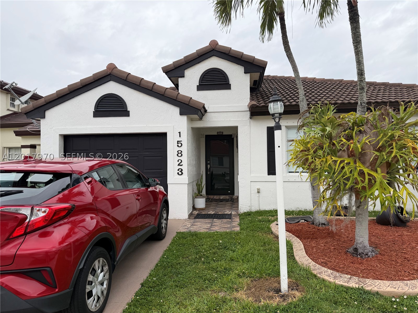 Beautiful home located in a highly desirable area of Miami near top-rated schools, shopping centers, restaurants, and major highways. This property features spacious living areas, abundant natural light, and a functional layout perfect for comfortable living and entertaining. Garage has been legally converted into an additional bedroom, ideal for guests, a home office, extended family, or potential extra rental income. Enjoy a private backyard perfect for family gatherings. Low HOA only $138 quarterly. Easy to show. Great opportunity for homeowners or investors.