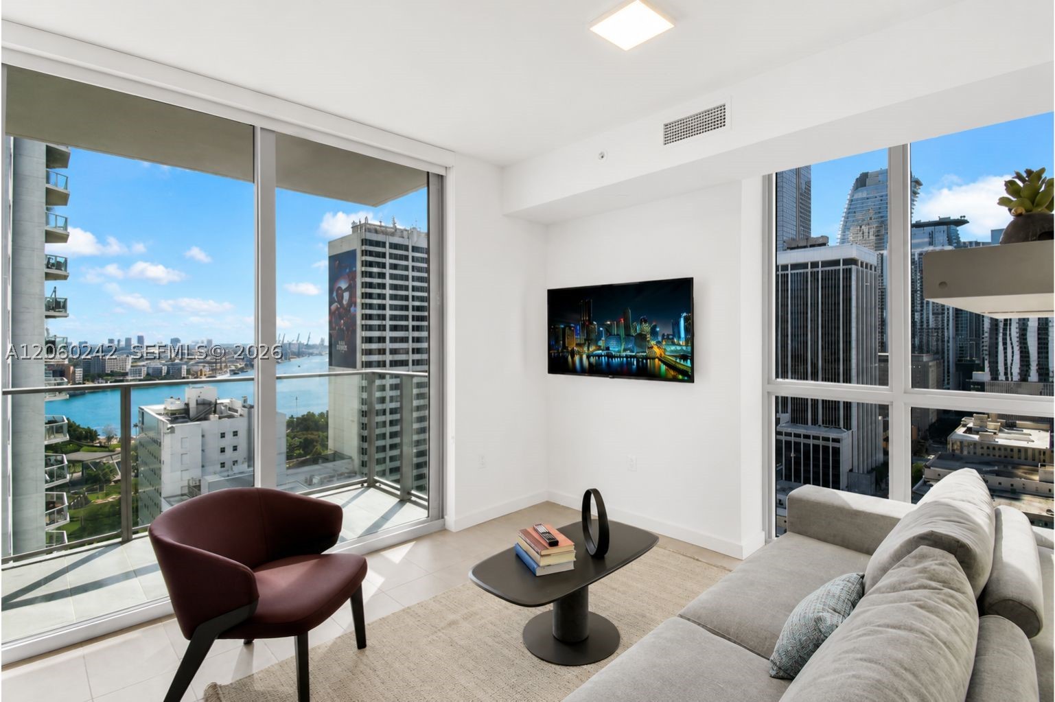 High-floor corner residence with unobstructed view!! Experience one of the most desirable 1-bedroom residences at YOTELPAD Miami. Perfectly positioned on a coveted high-floor corner line, this rare turnkey residence showcases panoramic, unobstructed skyline and Biscayne Bay views with a glimpse of the Intracoastal—an exceptional feature not offered by any other active units in the building. Floor-to-ceiling windows fill the unit with natural light, creating an open, airy feel while framing Miami's iconic skyline. Fully furnished and income ready, the residence features a sleek European-style kitchen with quartz countertops and premium appliances, in-unit washer and dryer, spa-inspired bathroom, spacious bedroom, and private balcony designed to capture the breathtaking views.YOTELPAD Miami offers one of Downtown Miami's most flexible ownership opportunities with no rental restrictions, making it ideal as a primary residence, vacation home, or high-performing Airbnb investment. Enjoy resort-style amenities including a pool with private cabanas, fitness center by Homage, owners' lounge, co-working spaces, on-site dining, valet, and 24-hour concierge.
Steps from Bayfront Park, Bayside Marketplace, Kaseya Center, Miami Worldcenter, Brightline, Brickell, PortMiami, and the Metromover, this is Downtown Miami living at its finest.
