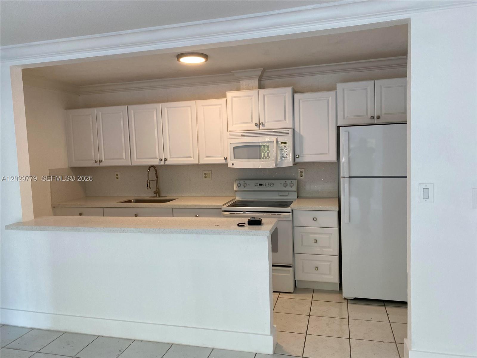 This beautifully updated condo in the heart of Doral offers the perfect blend of comfort and convenience. Its modern open-concept layout seamlessly connects the living, dining, and kitchen areas, creating an ideal space for everyday living and entertaining. Step outside to your own cozy patio, the perfect spot to unwind and enjoy weekend mornings or evenings. Residents also enjoy access to tennis courts, a swimming pool, and well-maintained community amenities. Located just minutes from schools, shopping, dining, and supermarkets, this home provides everything you need for comfortable South Florida living.