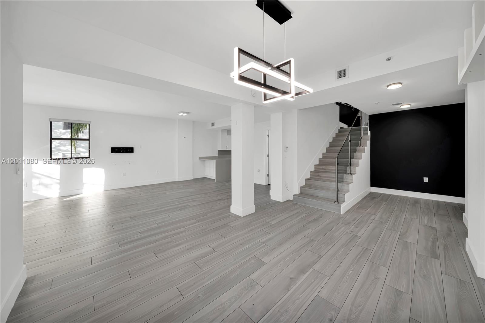 Discover this updated modern corner townhouse nestled in a boutique-style community on a picturesque, tree-lined street—just an easy 8-minute walk to Giralda Avenue and Miracle Mile. Perfectly situated across from Phillips Park, tennis courts, and Publix, this residence offers exceptional walkability and convenience right at your doorstep. Step inside to a spacious open living area featuring sleek modern finishes, including a contemporary glass stair railing. Upstairs, both bedrooms offer private en-suite bathrooms and generous walk-in closets. Additional features include impact windows and doors, plus a secure, private alarm system. Residents enjoy access to amenities such as a gym, pool, and business center. With only 18 units like this in the community—and very few ever hitting the market—this is a rare opportunity. Schedule your private tour today!