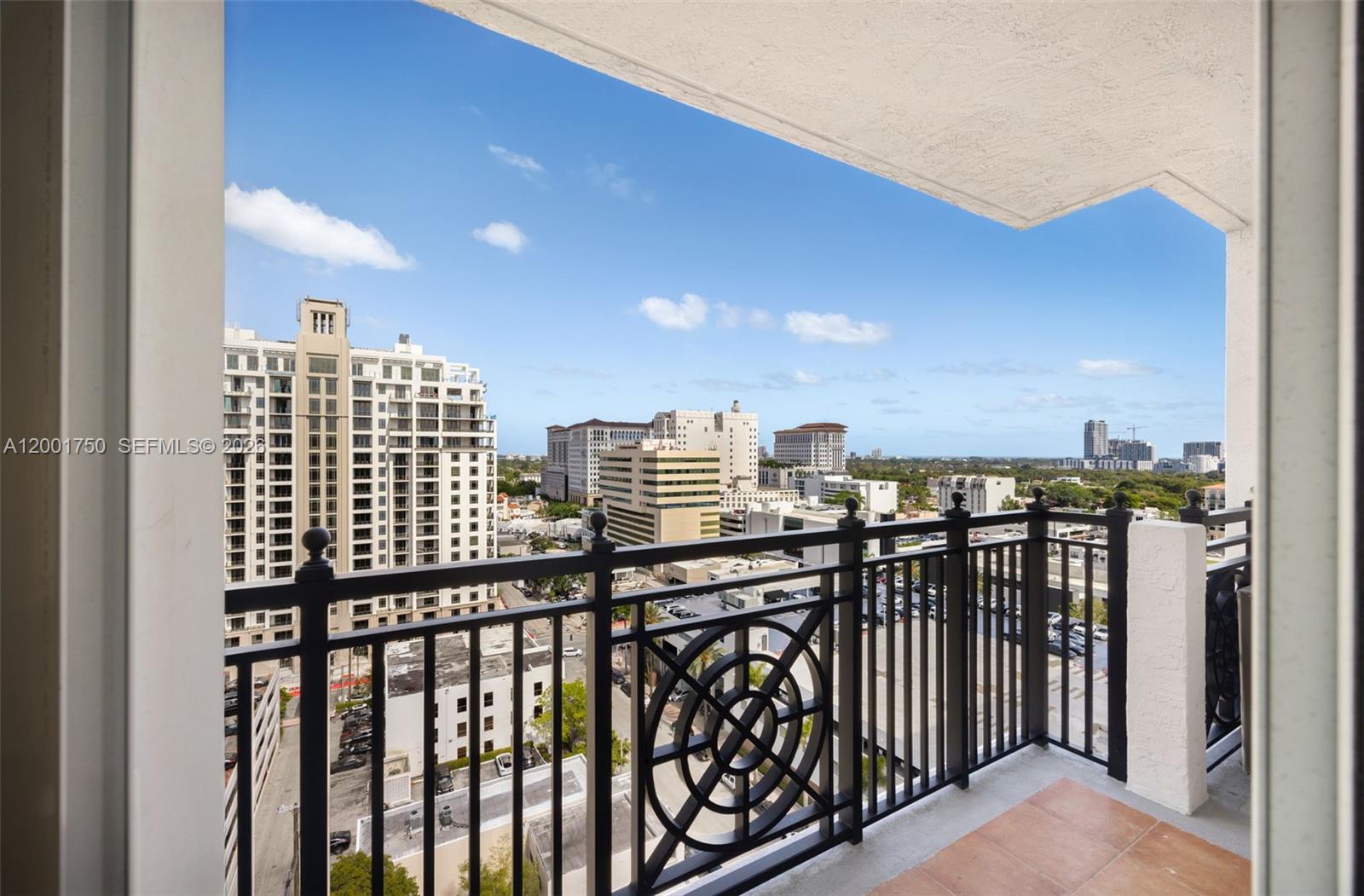 In the heart of Coral Gables, this bright 2 bed 2 bath + Den residence offers refined living just steps from the city’s iconic dining, shopping, and cultural hubs. Perched on a high floor, the home features expansive city views and a flood of natural light. The functional layout features an open living and dining area connected to the kitchen, complete with marble countertops, stainless steel appliances, snack-bar seating, and double sink. A private balcony spans from the living area to the primary suite, providing a peaceful retreat to overlook the skyline. The primary bath features a separate soaking tub and glass shower, while the versatile den serves as a perfect home office, library, or guest space. Residents enjoy an in-unit washer/dryer plus premium building amenities like a pool and gym. Notably, the garage provides plenty of guest parking spaces alongside secure resident spots. Located within walking distance to Miracle Mile and the area’s most popular boutiques, this property offers a seamless lifestyle in one of Miami’s premier neighborhoods. This 2 bed 2 bath + Den is truly a rare find that combines luxury and utility in a world-class location. Experience the best of Gables living today in this high-floor gem.