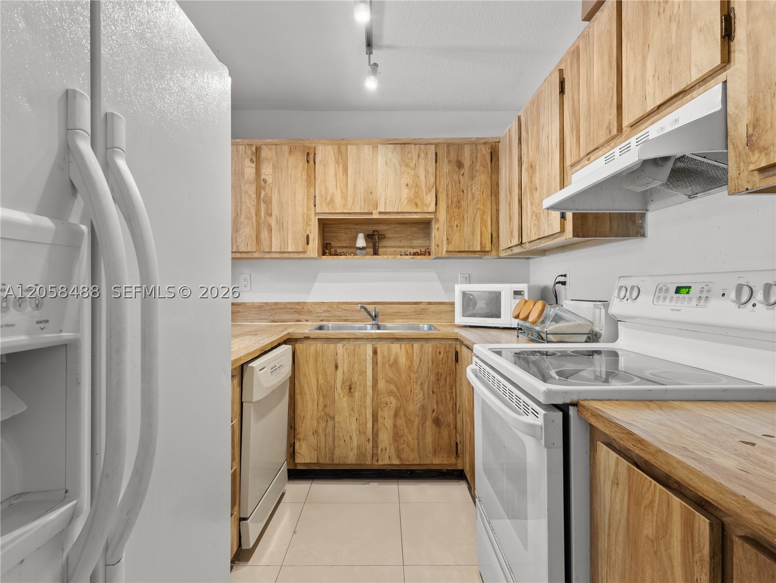 WISPERWOOD VILLAGE CONDO - Residential
