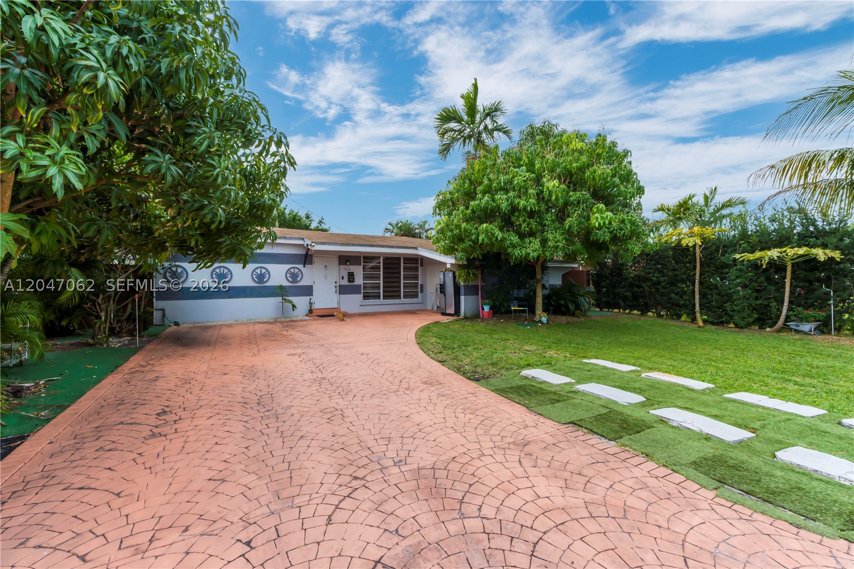 Welcome to this inviting 5-bedroom, 4-bath single-family home nestled in the heart of Miramar! This charming one-story residence sits on a generously sized lot and features a sparkling below-ground pool, perfect for relaxing, entertaining, or enjoying Florida’s year-round sunshine.

Step outside to your private fenced backyard oasis complete with a patio, awnings, hurricane shutters, and plenty of room for gatherings and outdoor enjoyment. A covered carport and driveway provide ample parking.

Conveniently located near schools, parks, shopping, dining, and major highways, this home offers comfort, flexibility, and excellent accessibility. With no HOA and no rental restrictions, it’s ideal for homeowners and investors alike. Whether you’re a first-time buyer, downsizing, or seeking a solid investment opportunity, this property is full of potential. Schedule your private showing today!