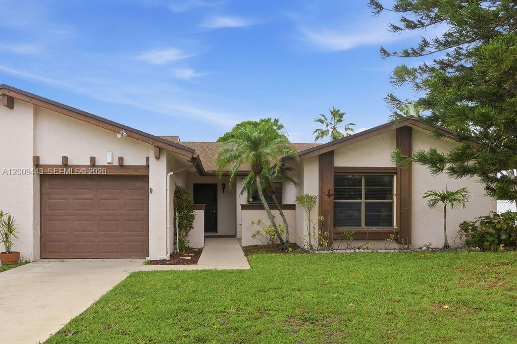Well-maintained 2-bedroom, 2-bath villa with detached garage located in the highly desirable Cloisters community, a 55+ neighborhood known for its peaceful setting, well-kept surroundings, and true low-maintenance lifestyle. This home offers an excellent and functional layout filled with natural light, creating a bright and comfortable living environment. Enjoy a spacious screened porch, perfect for relaxing with your morning coffee or entertaining guests in a private outdoor setting. The property also features an extensive driveway, providing added convenience for parking and visitors. Recent updates include a roof replaced in 2019, and the home includes washer and dryer conveniently located in the garage. Cable is included in the maintenance, adding extra value and ease of living. Cloisters is a well-established community with great amenities including a pool, clubhouse, tennis courts, and beautifully maintained green spaces. Residents enjoy a quiet and active lifestyle with walking paths, nearby parks, and easy access to shopping, dining, and everyday essentials, all just minutes away. The beach is also a short drive, making this an ideal location for enjoying the South Florida lifestyle. This is a fantastic opportunity for a buyer looking to personalize a home with great bones in a community that continues to be in high demand. Best value in Cloisters. Don’t miss the chance to make it your own.