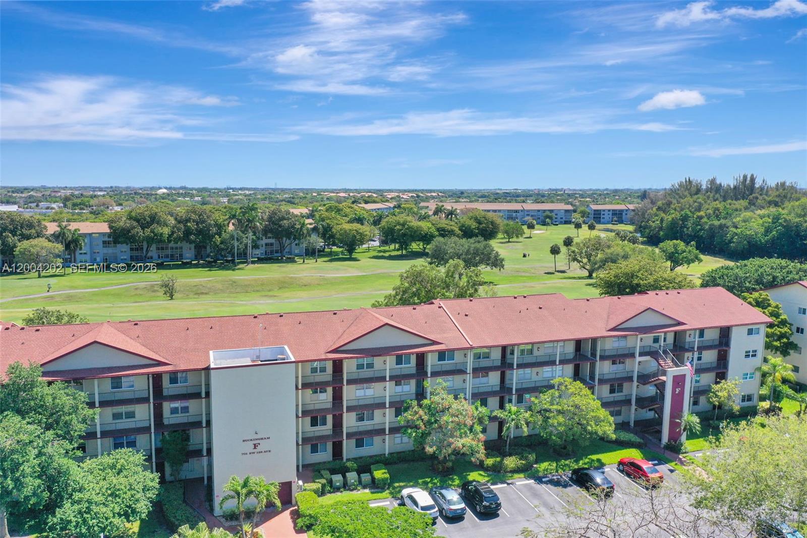 Immaculate, upgraded condo with serene golf course views located in the heart of Pembroke Pines. Situated in the sought-after 55+ Century Village community offering resort-style amenities. This bright and spacious 2-bedroom, 2-bath unit features waterproof laminate flooring throughout and no popcorn ceilings. Enjoy a clean kitchen with newer appliances, plus the convenience of an in-unit washer and dryer. The large primary suite includes a walk-in closet and private bath. Additional highlights include accordion shutters, balcony storage, and assigned parking with ample guest spaces. 24 hour manned gated community. Century Village counts with a sophisticated medical alert system. An in-house bus transportation makes it very convenient to access local malls, shopping centers and medical facilities. An impressive 23 Indoor and outdoor heated pools are located throughout the property. A variety of meeting rooms used for card games, bingo, arts and crafts, music, ceramics, computer, Camera Club, Domino Club, Karaoke Club, well appointed library, relaxing sauna, and other classes provide many options for your participation. An over-sized billiard room, Shuffleboard, tennis courts, fishing, sailing, bocce ball, and an 18-hole, par 71 championship golf course are all located on site and available at no additional cost to residents. Counts with an extensive picnic and barbecue area as well. Association covers water, cable, and WiFi. Move-in ready. Sold AS-IS.