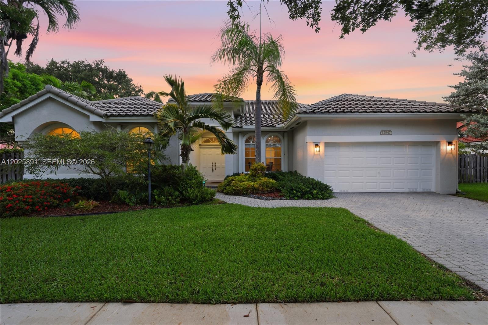 RARELY AVAILABLE PRINCETON MODEL FEATURING 5 BEDROOMS ON A PRIVATE LOT WITH A RESORT-STYLE BACKYARD DESIGNED FOR ENTERTAINING & EVERYDAY LIVING! * THIS BEAUTIFULLY MAINTAINED HOME FEATURES MODERN LARGE-FORMAT TILE FLOORING THROUGHOUT, CREATING A CLEAN & ELEGANT FEEL * THE UPGRADED KITCHEN OFFERS REAL WOOD SHAKER CABINETRY, GRANITE COUNTERTOPS & STAINLESS-STEEL APPLIANCES, ALL OPEN TO THE SPACIOUS FAMILY ROOM FOR SEAMLESS INDOOR-OUTDOOR LIVING * THE OVERSIZED PRIMARY SUITE FEATURES SLIDING GLASS DOORS WITH DIRECT ACCESS TO THE BACKYARD OASIS * STEP OUTSIDE TO A COVERED PATIO & LARGE FREEFORM POOL SURROUNDED BY LUSH PROFESSIONALLY LANDSCAPED GROUNDS—PERFECT FOR RELAXING IN PRIVACY OR HOSTING FAMILY & FRIENDS * ADDITIONAL UPGRADES INCLUDE A 2017 ROOF & ACCORDION SHUTTERS FOR PEACE OF MIND * PEMBROKE FALLS IS A RESORT-STYLE GATED COMMUNITY FEATURING A STATE-OF-THE-ART CLUBHOUSE WITH POOL, TENNIS, PICKLEBALL, BASKETBALL, FITNESS CENTER & MORE * COMMUNITY OFFERS NATURAL GAS * HOA INCLUDES CABLE, FIBER OPTIC INTERNET, ALARM & 24HR SECURITY!