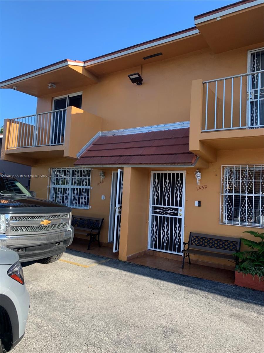 Remodeled two story Townhouse, corner unit 3 Beds and 2 Baths, balcony, living, open Kitchen, dining plus a den, terrace. Two parking spaces in front new tile floors throughout property. New roof 2018.Great location. This property won't last on the market. Call agent today for showing