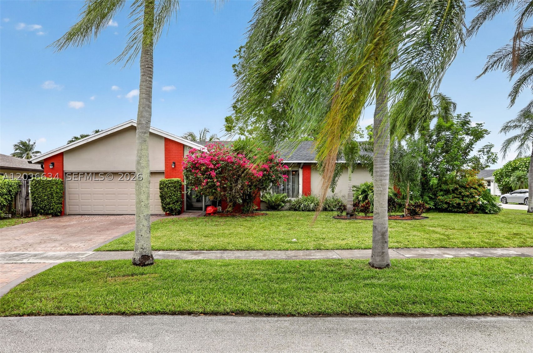 Beautiful renovated 3-bedroom, 2-bath home situated on a fenced oversized corner lot in the desirable Willow Creek community with NO HOA! Offering 1,590 sq ft of living area, this move-in ready home features tile flooring throughout, a renovated kitchen and updated bathrooms, newer roof (2026) and A/C (2026), plus accordion shutters on all windows. All doors and the garage door are impact for added protection and peace of mind. Well-water sprinkler system helps keep landscaping costs low. Enjoy great curb appeal with a stamped concrete driveway and spacious outdoor areas perfect for entertaining, pets, or future additions. Conveniently located close to shopping, restaurants, parks, schools, Coral Springs, Coconut Creek Promenade, and major highways. Great opportunity for homeowners looking for comfort, updates, and location!