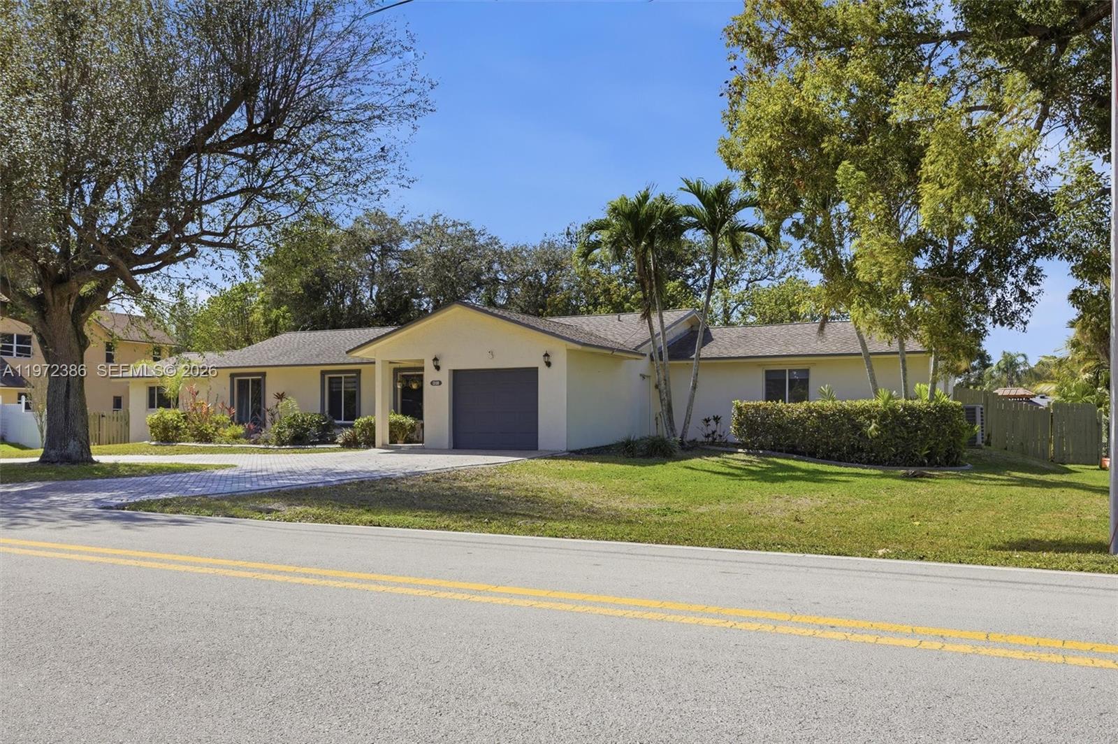 Stunning 4-bedroom, 3-bath residence showcases expansive living.The private backyard oasis is truly exceptional—featuring a resort-style pool, two strategically placed gazebos and tranquil pond views that create a serene and exclusive atmosphere.
Ideally located on Plantation acres close to the Equestrian Center, and just minutes from Sawgrass Mills Mall, with convenient access to major highways, fine dining, and premier shopping destinations.
An extraordinary opportunity to own a distinctive property in one of Plantation’s most coveted neighborhoods, where space, elegance, and location converge seamlessly.