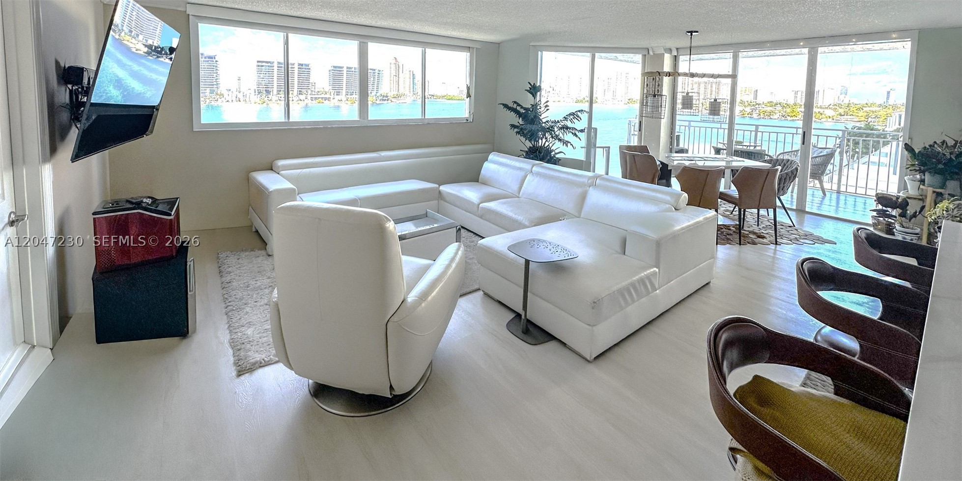 Step into this spacious, light-filled 2 bedroom, 2 bath residence in the heart of Sunny Isles Beach, where spectacular intracoastal views greet you from every room. Enjoy breathtaking sunset panoramas each evening, creating a serene backdrop to your home.
This beautifully renovated condo features a modern kitchen with high-end finishes, updated bathrooms, new flooring throughout, and an enhanced in-unit laundry room for added convenience. Every detail has been thoughtfully curated to offer comfort, style, and functionality. Perfectly situated in a well-maintained boutique building within a vibrant neighborhood, you’ll be just steps from everything you need—including shops, restaurants, and the ocean. A true blend of tranquility and walkability, this residence delivers the best of Sunny Isles living.