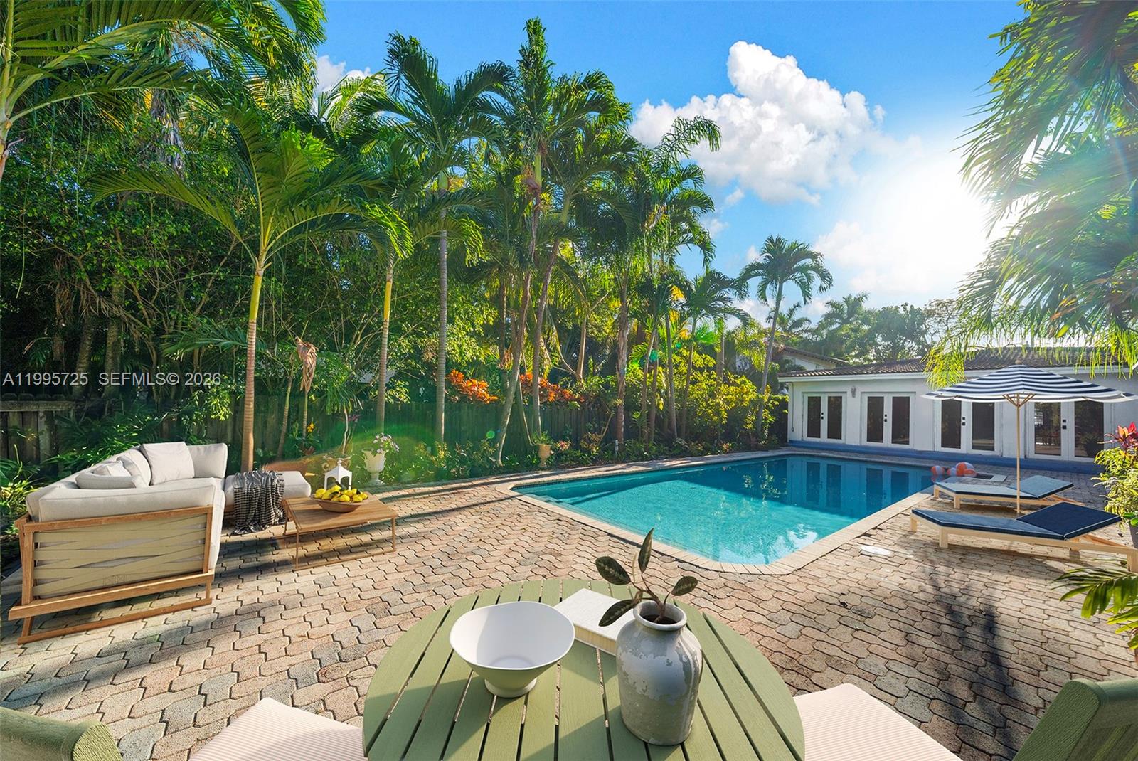 A rare opportunity to renovate and elevate a home on a generous 10,000 SF lot in Miami Beach. This 4-bedroom, 3-bathroom residence is surrounded by lush tropical greenery and features a pool along with mango, papaya, and cocoa trees, creating a backyard setting rich in charm, privacy, and possibility. The outdoor space offers a distinctly South Florida feel, with the scale and landscape to become a truly special extension of the home.

The existing residence provides an ideal canvas for a thoughtful renovation, allowing a buyer to create a more tailored and refined living experience while fully embracing the property’s setting and potential. Whether reimagining the interiors, enhancing the outdoor entertaining areas, or bringing a fresh design vision to the entire home, the opportunity here is substantial. With its generous lot size, tropical character, and inviting layout, this property offers the foundation for a beautifully customized Miami Beach residence.

Conveniently located near Bayshore Park, the Faena District, and the 41st Street corridor, the property combines location, scale, and long-term upside. A special opportunity for a buyer with vision to transform an existing home into something truly exceptional.
