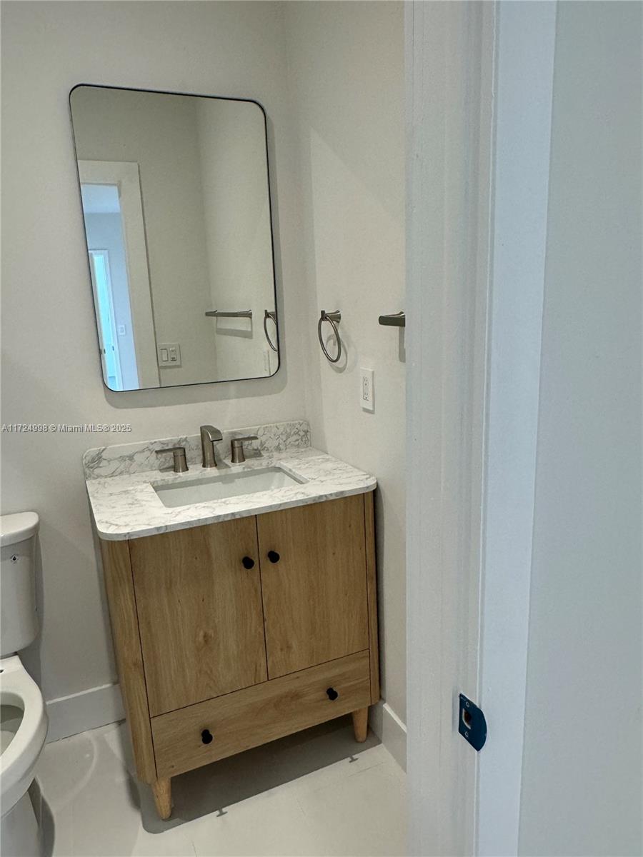 This beautifully renovated 4-bedroom, 2-bathroom home is a must-see! Every inch of this property has been updated, making it move-in ready. The home features brand new floors throughout, completely remodeled bathrooms, and a stunning new kitchen with sleek cabinets and top-of-the-line appliances. Enjoy the peace of mind that comes with a new A/C system, new washer & dryer,  impact-resistant windows.The home has been freshly painted both inside and out, for a clean, modern feel. Step outside to the expansive backyard, perfect for entertaining or relaxing. Located just minutes from the Metrorail and Hialeah Hospital, this property offers convenience and accessibility to all of the best amenities in the area. Don't miss the opportunity to live in this turn-key gem – schedule a showing today!