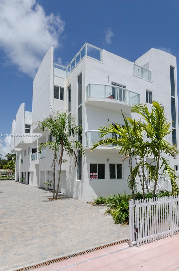 Townhome for sale in Normandy Isles in Miami Beach. Situated just minutes away from the iconic Miami Beach shoreline, you'll have easy access to pristine beaches, world-class dining, shopping, and entertainment. With vibrant areas like South Beach and the famous Ocean Drive nearby, the excitement of Miami is at your doorstep. This townhome boasts 2265 square feet of living space, featuring 3 bedrooms and 4 full bathrooms, ideal for families or professionals looking for both comfort and flexibility. Just renovated with high-end finishes, this property includes sleek modern kitchens with stainless steel appliances and quartz countertops. The living areas feature large windows that let in tons of natural light, creating a bright and inviting atmosphere. Boat slips available.
