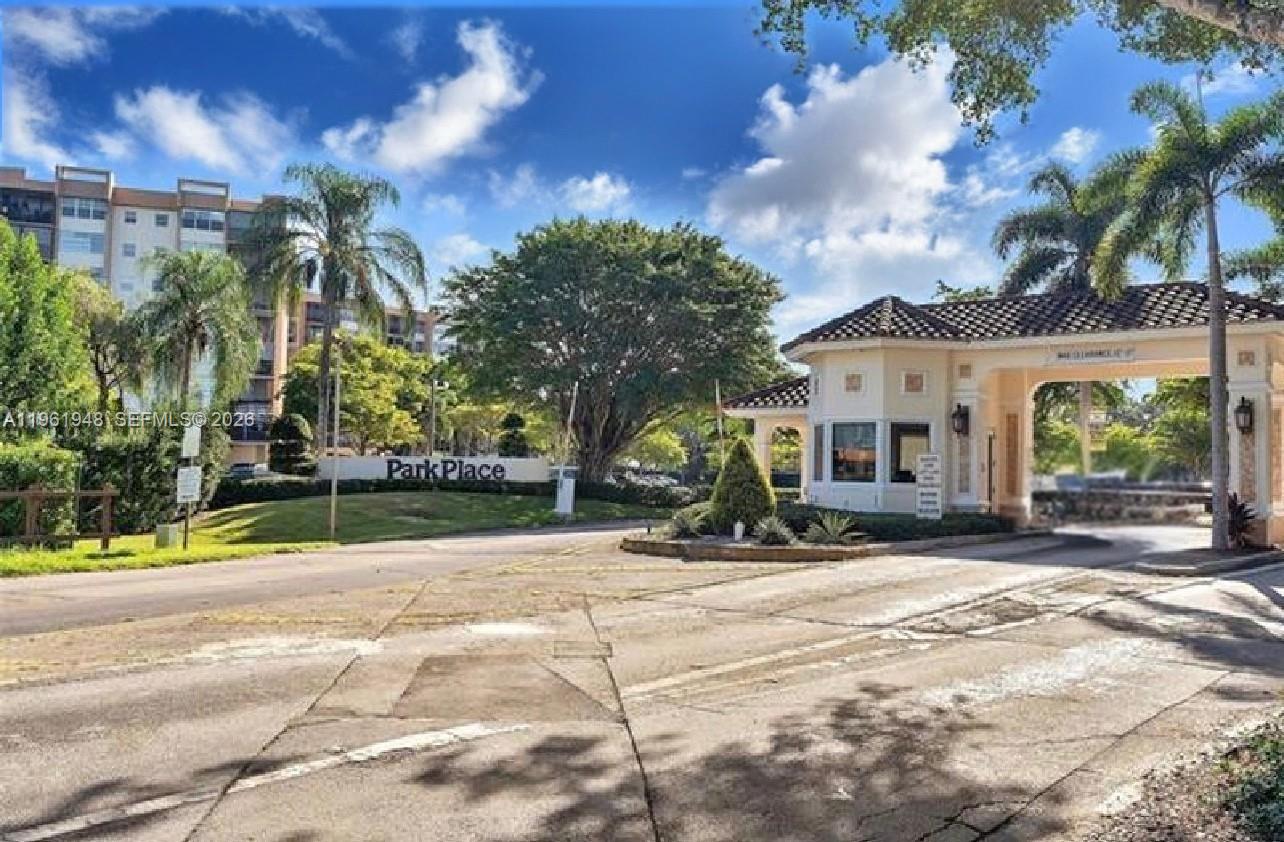 Perfectly located 1st floor unit near all building ammenities. This is a 1 bedroom convertible model. Offers additional square footage that can be used to convert to a 2nd bedroom. 2 full bathrooms. Large walk in closets, updated kitchen, and bathrooms. Tile throughout and move in ready. Park Place is a 55+ community with a 24/7 guard gate  providing added security to an alreat wonderful neighborhood. Community supports an active or leisure lifestyle with walk/jog paths, tennis and pickle ball courts, as well as pools, card rooms, fitness classes and more!