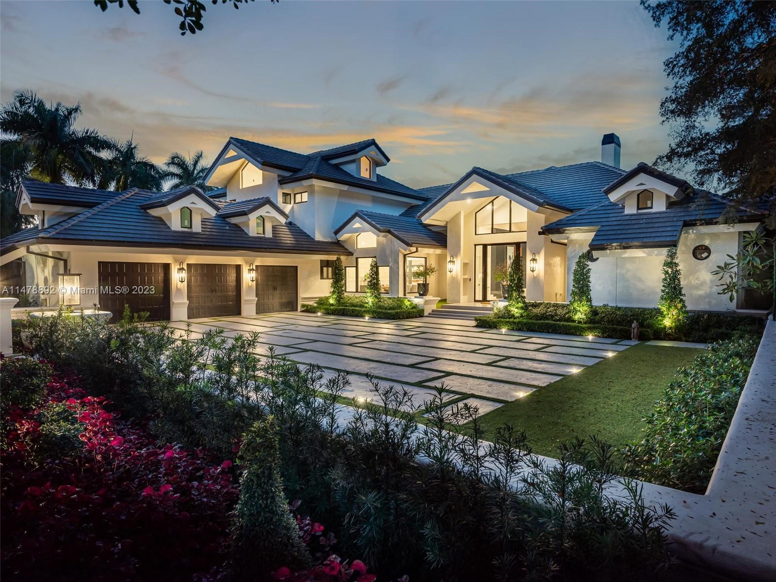 Indulge yourself in sheer opulence in this custom renovated waterfront estate in the coveted guard gated Windmill Ranch Estates. Setback on a long, private driveway, a true entertainer’s delight. Completely renovated smart home with the most luxurious finishes featuring; brand new roof & custom impact windows and doors, designer chef’s kitchen, bathrooms, flooring and more. Sleek, modern & neutral throughout with the perfect distribution for a large family. Dramatic light filled foyer leads to the formal living room with contemporary fireplace, soaring ceilings and panoramic water views. Resort style backyard with modern pool, turf and plenty of room for the kids to play. Hurry, this one won’t last!