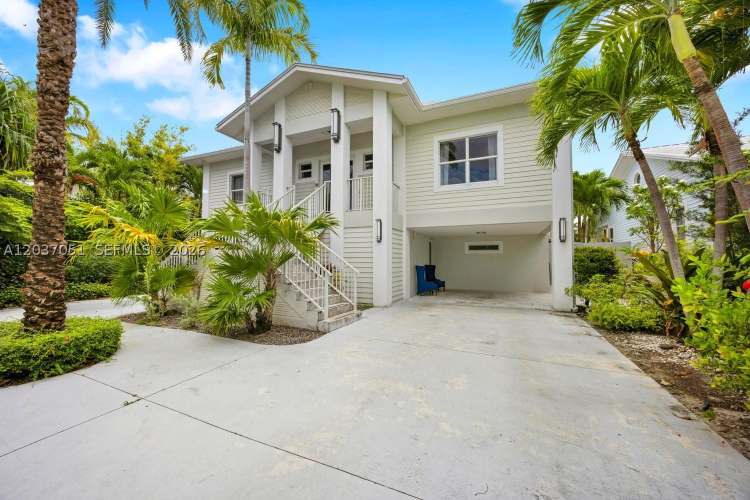 Experience the best of Miami waterfront living at this fully furnished estate on coveted Little River. Featuring 6 bedrooms, 5 bathrooms, and 4,432 SF of living space on a 10,055 SF lot, this gated property offers 75 feet of waterfront frontage, a private dock, and direct ocean access with no fixed bridges. Behind a gated entrance, the home welcomes you with soaring ceilings, expansive open-concept living areas, and abundant natural light. The spacious great room seamlessly flows into a chef's kitchen featuring custom cabinetry, premium stainless-steel appliances, oversized countertops, and generous dining space designed for entertaining family and guests.The home includes two waterfront primary suites, spacious guest accommodations, and seamless indoor-outdoor living throughout. Outside, enjoy a private resort-style retreat complete with a heated saltwater pool, tropical landscaping, expansive sun deck, waterfront lounge areas, oversized hanging chairs, and a fully equipped summer kitchen featuring a built-in grill, wood-fired pizza oven, and covered dining area. Designed for both relaxation and entertaining, this exceptional waterfront property delivers the ultimate South Florida lifestyle.