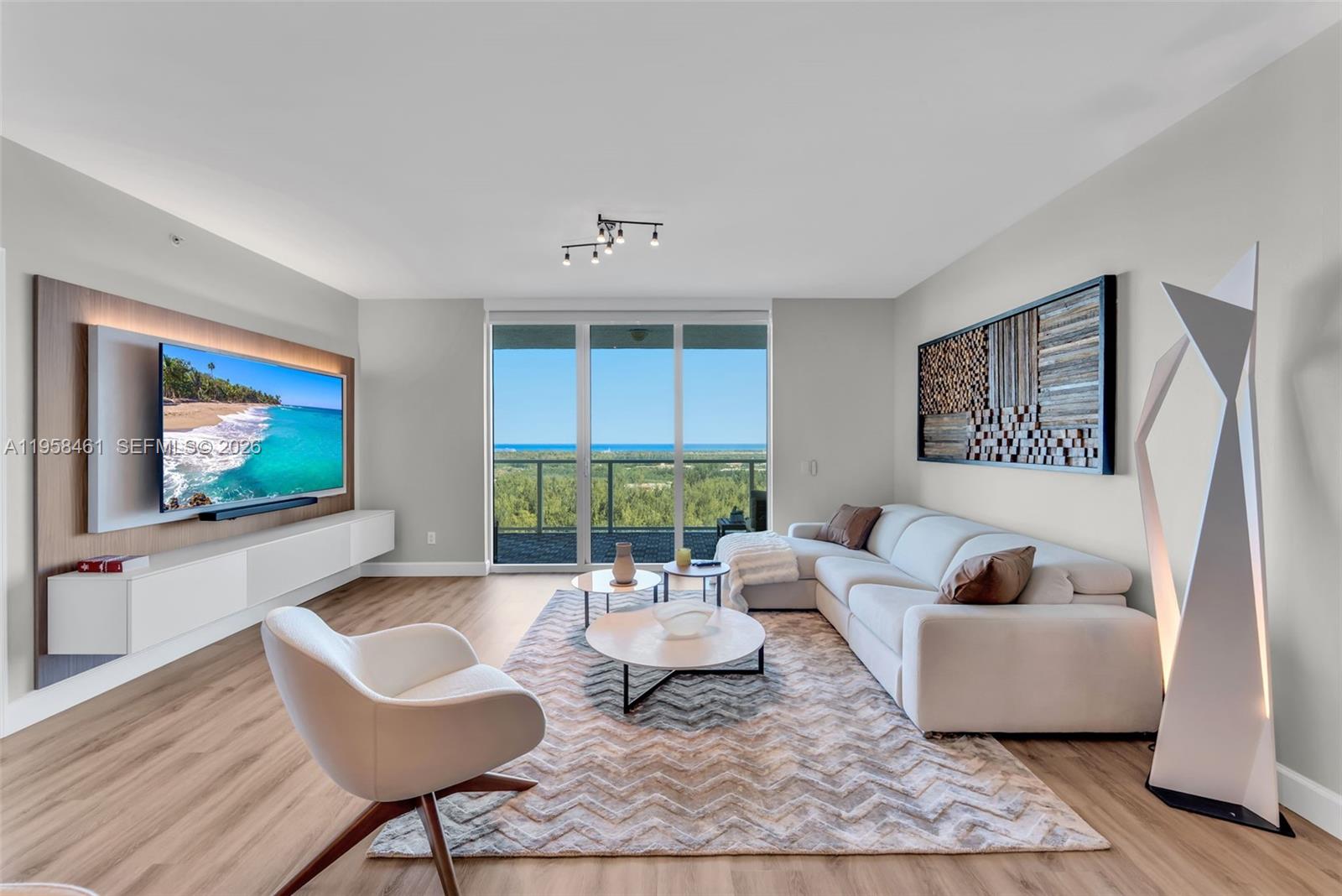 Enjoy breathtaking unobstructed views of the ocean, Oleta River State Park, and skyline from this 3 bed/3.5 bath residence featuring a spacious private balcony ideal for relaxing or entertaining. This bright and modern home offers impact windows and doors, open-concept living and dining areas, modern flooring, and abundant natural light throughout. The primary suite features dual walk-in closets with new custom built-in shelving and a spa-inspired bathroom with dual vanities, jacuzzi tub, and separate glass-enclosed shower. The sleek kitchen is equipped with stainless steel appliances, granite countertops, and ample cabinetry.

Located in a gated, full-service community with resort-style amenities including a new clubhouse, fitness center, heated pool, tennis courts, playground, dog park, valet, EV charging stations, and 24-hour security. HOA includes water, cable, and internet. Ideally located just minutes from Aventura Mall, Sunny Isles Beach, Oleta River State Park, dining, shopping, and easy access to major highways.