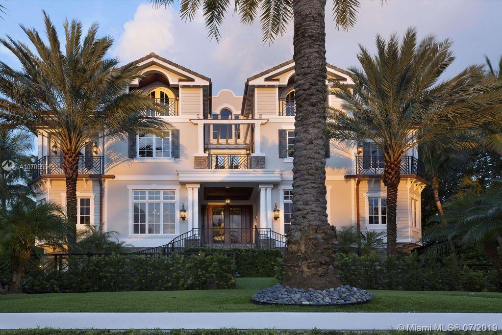 OCEAN TO INTRACOASTAL ESTATE BY EVERTON DEVELOPMENT ON THE EXCLUSIVE AND SOUGHT AFTER HILLSBORO MILE. Distinctive three-story family designer finished estate with impressive waterway views from all major rooms. This Gorgeous Estate offers 5 bedrooms, club room, theater, exercise room, and wine cell! Quintessential for outdoor entertaining. The backyard is enhanced by Italian marble oceanfront terraces, fireplaced south and north piazza with summer kitchen, amidst of fountains jetting into the incandescent pool and spa. Intracoastal side accesses the 70+/-foot full-service dock with 30,000-pound Neptune boat lift. Just minutes to the Hillsboro Inlet. Information herein deemed reliable & subject to errors, omissions or changes without notice. All measurements are approximate.