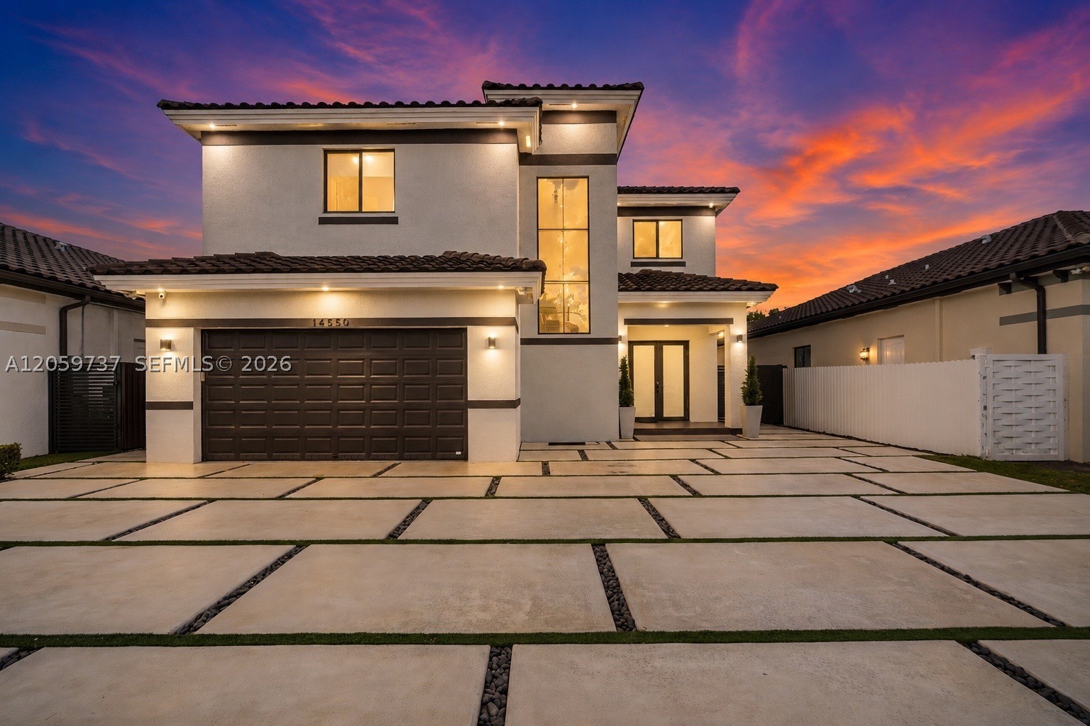Stunning home in sought after location! Impeccable, beautiful, modern, custom-built uniquely and artistically designed 4 bed 4 bath home that will wow you as soon as you walk in! Open floor plan with plenty of natural light throughout, high ceilings, recess lighting, gorgeous custom-made kitchen with quartz countertops and custom-built cabinets, cooking island perfect to entertain while you cook a great meal for family or friends, beautiful tile flooring downstairs and high-quality vinyl upstairs, high impact windows and doors, unique built-in storage space under staircase perfect for added storage space or shoe closet, upgraded bathrooms, spacious rooms with full baths inside, huge master room with closet organizers, enclosed lanai overlooking the patio just waiting for your pool to be added and much more! So, if you are looking for affordable luxury and the tranquility of an excellent neighborhood with a location close to excellent schools, shopping, restaurants, proximity to the turnpike, gyms and places of worship, this is it! Make your appointment today, this home will not last. Recently appraised and perfectly priced.