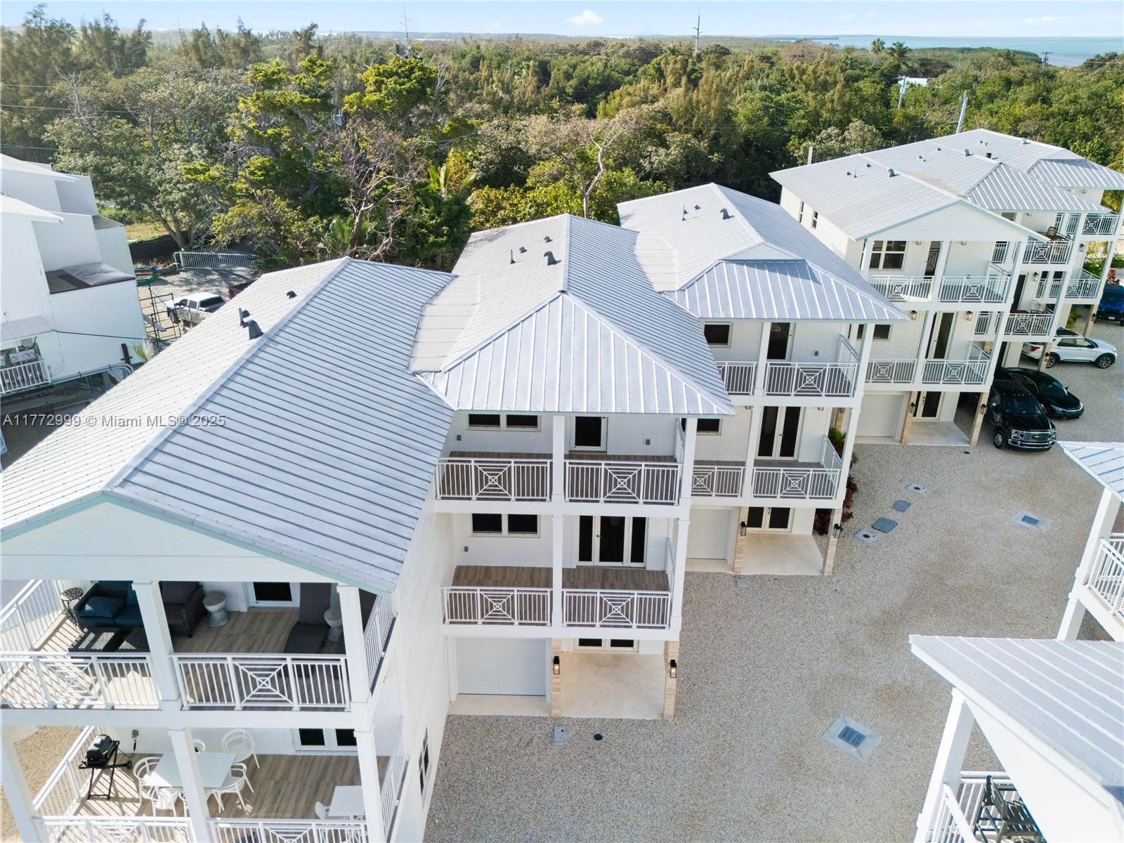 Peaceful Palms, a newly developed gated community offering 15 exclusive high-end townhomes in the heart of the Florida Keys. This oceanfront retreat boasts breathtaking views of the renowned Sandbar and Alligator Reef Lighthouse, providing the perfect blend of luxury, relaxation, and investment potential. Each three-bedroom, three-bathroom townhome is thoughtfully designed with expansive balconies on both the second and third floors, a spacious garage, and pet-friendly accommodations. Peaceful Palms is designed to accommodate weekly rentals with the proper permitting, offering an incredible opportunity for investors. With the possibility of new building permits becoming unavailable in the Florida Keys, now is the time to secure your place in this sought-after destination.