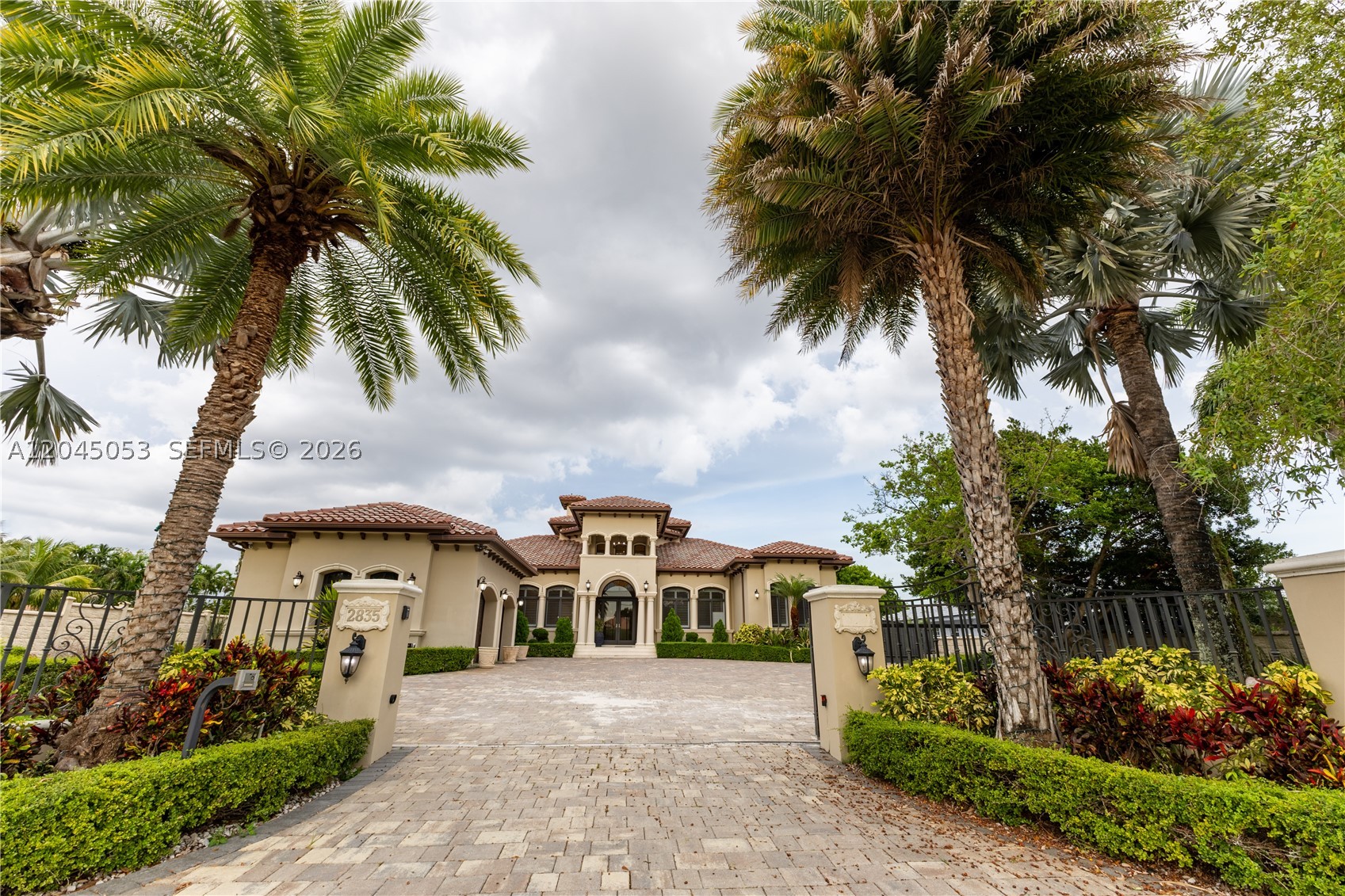 Welcome to your dream home where luxury meets entertainment! This stunning property features an incredible man cave complete with a custom bar, ping pong table, foosball, projector screen, and premium sound system - perfect for game nights or watching the big game with friends.Step outside to your private paradise where a spacious backyard awaits with a tropical tiki hut/bar, sparkling pool, relaxing jacuzzi, built-in barbecue, and outdoor cooking stove. This is the ideal setting for hosting unforgettable gatherings or simply enjoying Miami's beautiful weather.The master suite offers a spacious retreat with an impressive walk-in closet providing ample storage space. Every detail of this home has been designed with both comfort and entertainment in mind.Located in the desirable Miami area, this property offers the perfect blend of luxury living and entertainment options that will impress even the most discerning buyer.