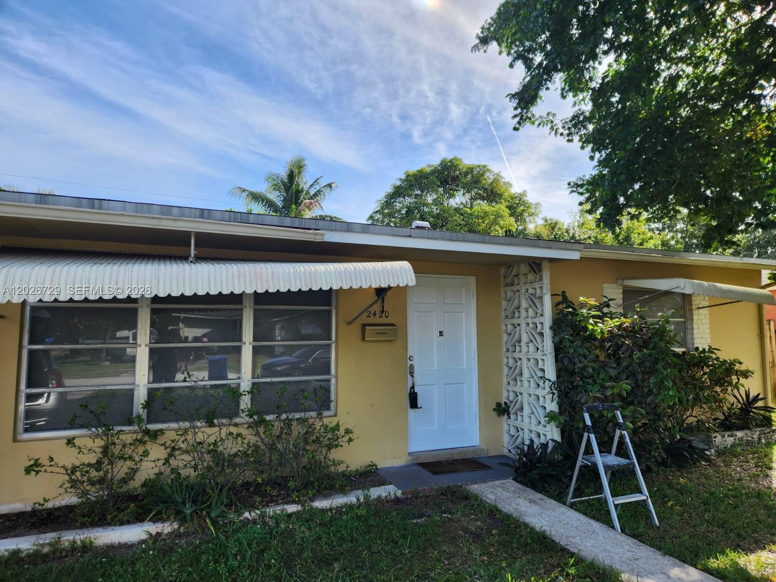Fantastic Investment opportunity in Sunrise! Price to sell fast! This charming and cozy 2/1 single-family home features a versatile den—perfect for a home office, playroom, or guest space. The real showstopper is the massive, oversized backyard, offering incredible space with plenty of room to securely park 3/4 vehicles, a boat, or an RV. Beautiful outdoor potential for entertainment or future expansion. Nestled in a quiet neighborhood with no HOA.