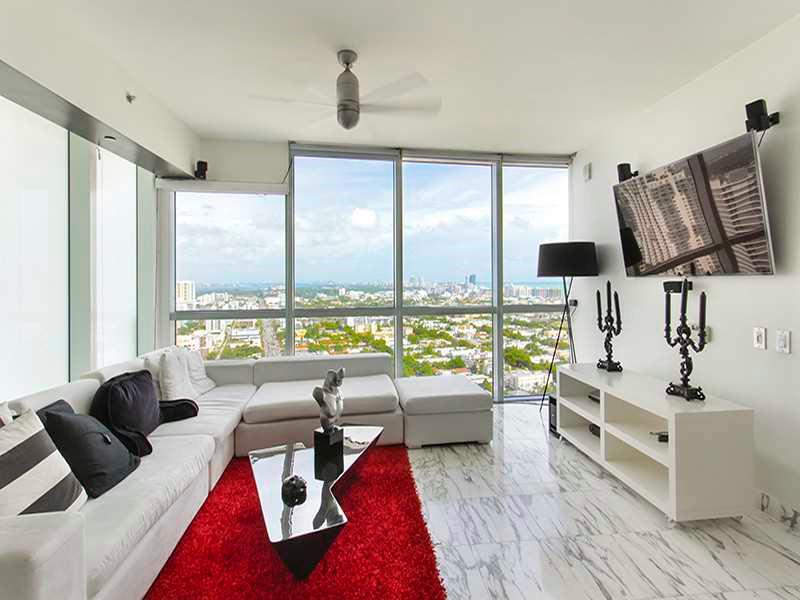Highest floor available, line 08, fully furnished 1 Bed/1.5 Bath rental at Icon South Beach, available immediately for a year lease only. Panoramic views of the Bay, Ocean, and South Beach. Beautiful marble floors throughout with carpeting in the bedroom.   The ICON South Beach offers luxury amenities including 2 pools, restaurant, spa, fitness center, library and free valet for guests.