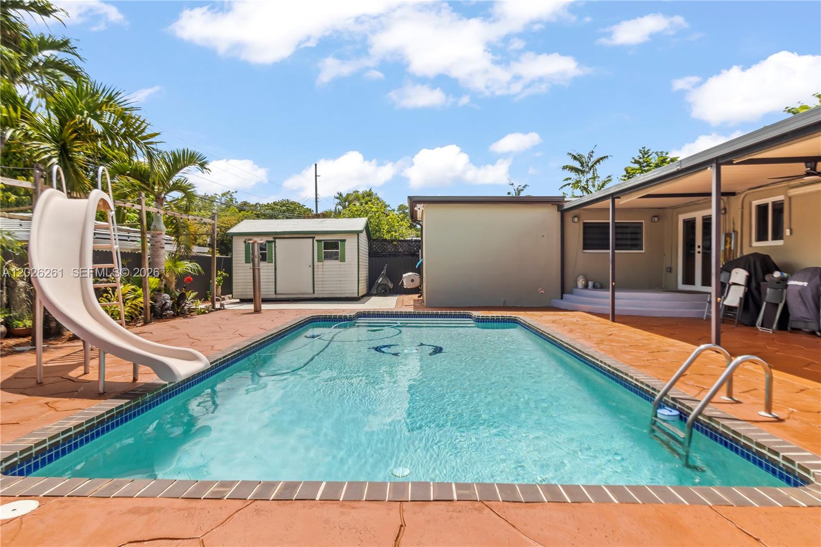 Charming 3BR/2BA + den single-family home in the highly sought-after Gables View neighborhood! This bright, functional residence offers complete peace of mind and excellent energy efficiency with a tile roof, impact windows and doors, central A/C (including a mini-split and 2019 ductwork), blown-in attic insulation, and a washer/dryer—all fully updated in 2019. Inside, you will find beautifully renovated bathrooms (2019) and a cozy, turnkey layout. The generous lot is a true backyard oasis, featuring a 15x30 swimming pool, a large storage shed, and ample dedicated space for your RV or boat. Centrally located just minutes from Coral Gables, major highways, excellent local schools, and top-tier dining and shopping. Perfect for first-time buyers or anyone looking for a well-maintained retreat in a quiet, established community. Schedule your private tour today
