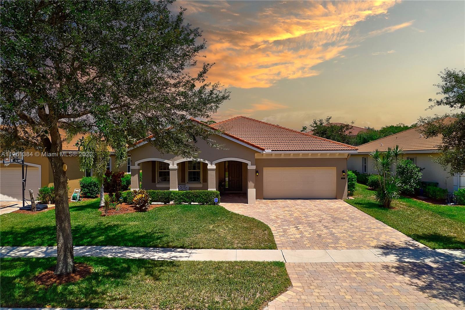 This home is located in a quiet neighborhood, away from major traffic, yet still close to stores, schools, hospitals, medical offices, and recreational amenities (parks, golf courses, walking trails, etc.). The home has recently received fresh exterior paint, and a brand-new A/C system. New Frigidaire fingerprint-resistant, stainless steel kitchen appliances, new LG washer and dryer combo, new luxury vinyl flooring in all bedrooms; finished garage floor, security system. Newly installed accordion shutters make it a breeze to protect windows and sliding doors from storms during hurricane season!