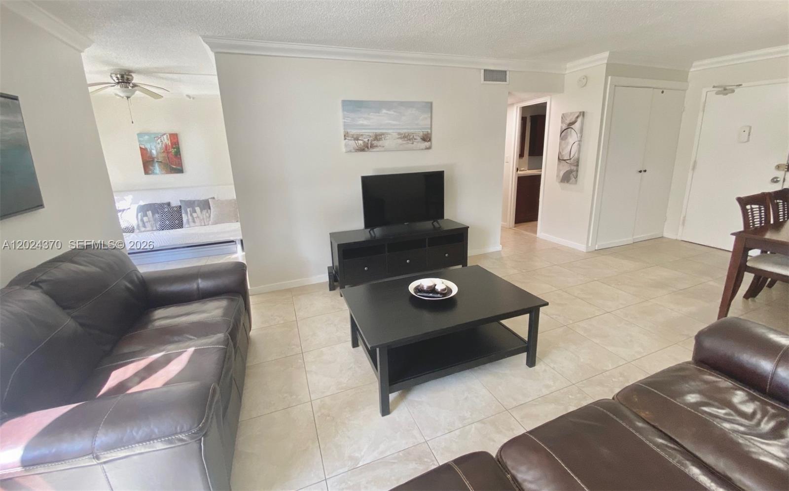 WALK TO THE BEACH from this fully furnished 1 bedroom + den, 1.5 baths. Located in the most coveted neighborhood in Florida, surrounded by iconic luxury buildings like Porsche, Armani, Bently, Turnberry towers and others. The master bath is beautifully renovated with a glass walk-in shower and a double vanity. The den could be used as a second bedroom, office or even a breakfast/dining area. AC unit is aprox 2 years old. Brand new dishwasher just installed. The building has the following amenities: a big heated swimming pool, sauna, gym, billards room, event room and 1 assigned parking space. Brand new roof installed a couple of months ago. Just steps from a gorgeous supermarket, shops and fine dining. This is your piece of PARADISE! Come see it today!Live across from the beach!! In one of the most exclusive cities en Florida. This beautifully decorated 1 bedroom plus a den, 1 full bathroom and an additional guest bathroom can accomodate up to 3 people. Completely furnished. READY TO MOVE IN!! Request a showing by calling listing agent.