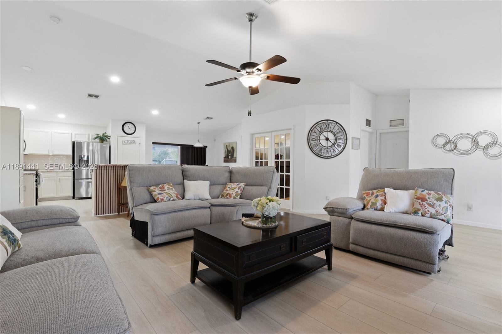 Welcome to this 3BR/2BA + den and pool home in Lehigh Acres, with stucco exterior. The open kitchen area features stainless steel appliances, tile floors throughout, and ceiling fans in every room. Spacious living area for entertaining. Split floor plan offers a private master suite with separate shower and tub/jacuzzi and dual sink. Two bedrooms share a bath with private access doors, also connecting to the den. Impact windows throughout except the sliding door to the patio (with shutters). Enjoy the screened lanai with an in ground resort style pool and private BBQ area. Roof less than 2 years old, central A/C, new water system 1 year old and functional layout designed for comfort.