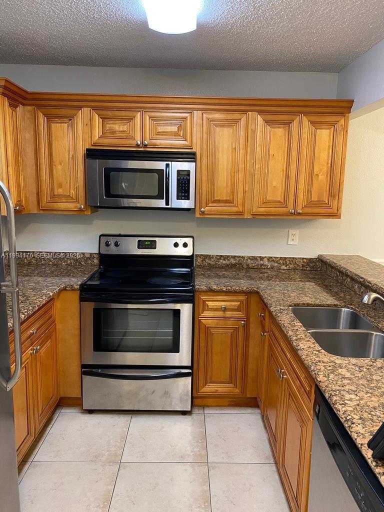 Investors Welcome!! Nice rented unit with low HOA! Excelent tenant. Unit rented at $1,975 per month. 2 bedrooms and 2 bathrooms. AC is 3 years old. Very close to Turnpike and major stores. Tenant on place so we need to schedule the showings 24 hours before. Pictures soon.