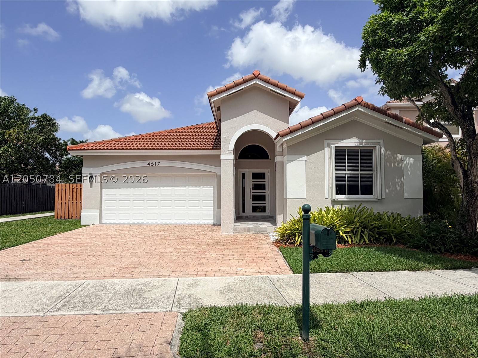 Experience comfort and elegance in this one story residence, nestled within the exclusive gated community of Goldvue Estates with 24 hour security. Open concept design with 4 bed, 3 full baths and 2 car garage all in one floor, a gourmet kitchen with stainless steel appliances, a private fenced backyard, residents have access to wonderful community amenities including a swimming pool and children's playground. A plus schools and walking distance to Publix, Walgreens, Starbucks, 10 minutes to Wholefood, Dolphin and International Malls.