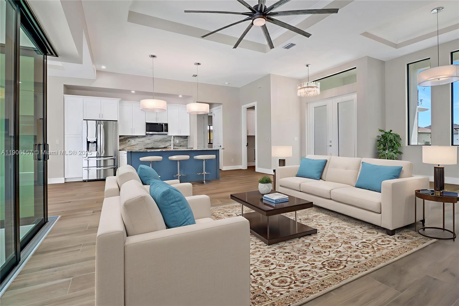 Stunning New Construction Pool Home – Modern Design & Exceptional Quality
This 3-bedroom, 2-bath, 3-car garage home showcases superior craftsmanship and contemporary style. The open-concept great room flows into a designer kitchen with a large granite island, 42" cabinets, upgraded appliances, and backsplash. Pocketing 90-degree sliders open to a covered lanai and sparkling pool with waterfall—perfect for relaxing or entertaining. The luxurious primary suite offers pool access and a spa-like bath with soaking tub, walk-in shower, and dual vanities. Features include tray ceilings, tile floors, impact windows/doors, metal roof, tie-beam construction, fenced yard, lush landscaping, and paver driveway. City water/sewer—assessments paid. Possible owner financing.