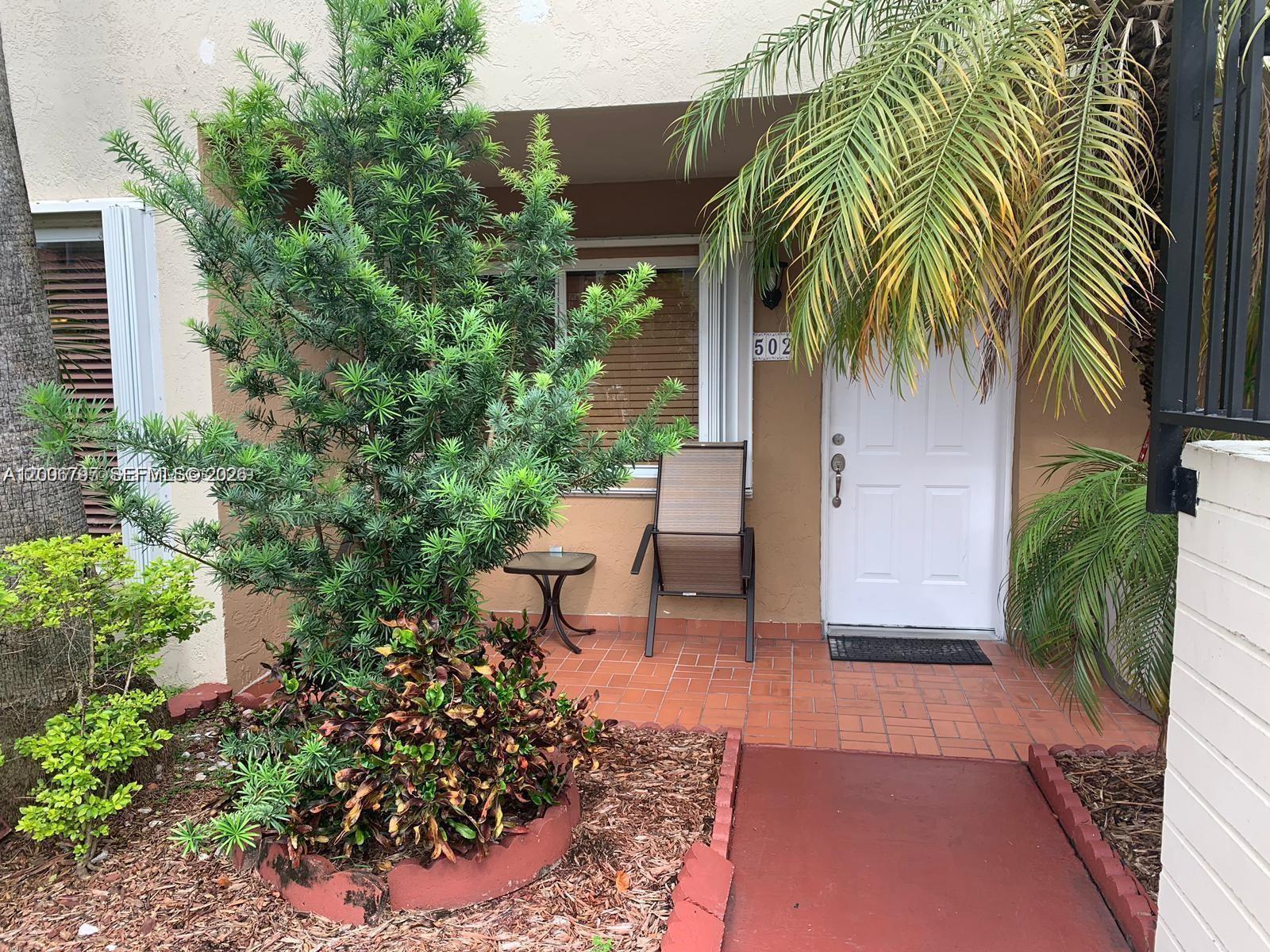 Spacious two-story apartment with the feel and layout of a townhouse, offering privacy and comfort rarely found in condo living. The main level features an open living area, a modern kitchen with granite countertops and stainless steel appliances, and a private patio perfect for outdoor relaxing or entertaining. Upstairs you will find 2 bedrooms, 2 full bathrooms and a convenient half bath. Two assigned parking spaces included. Concrete construction. Prime Doral location just minutes from Costco, Walmart and Sam's Club, with direct access to highways 836 and 826. Top-rated school zone. Unit is in excellent move-in condition. Tenant insurance required.